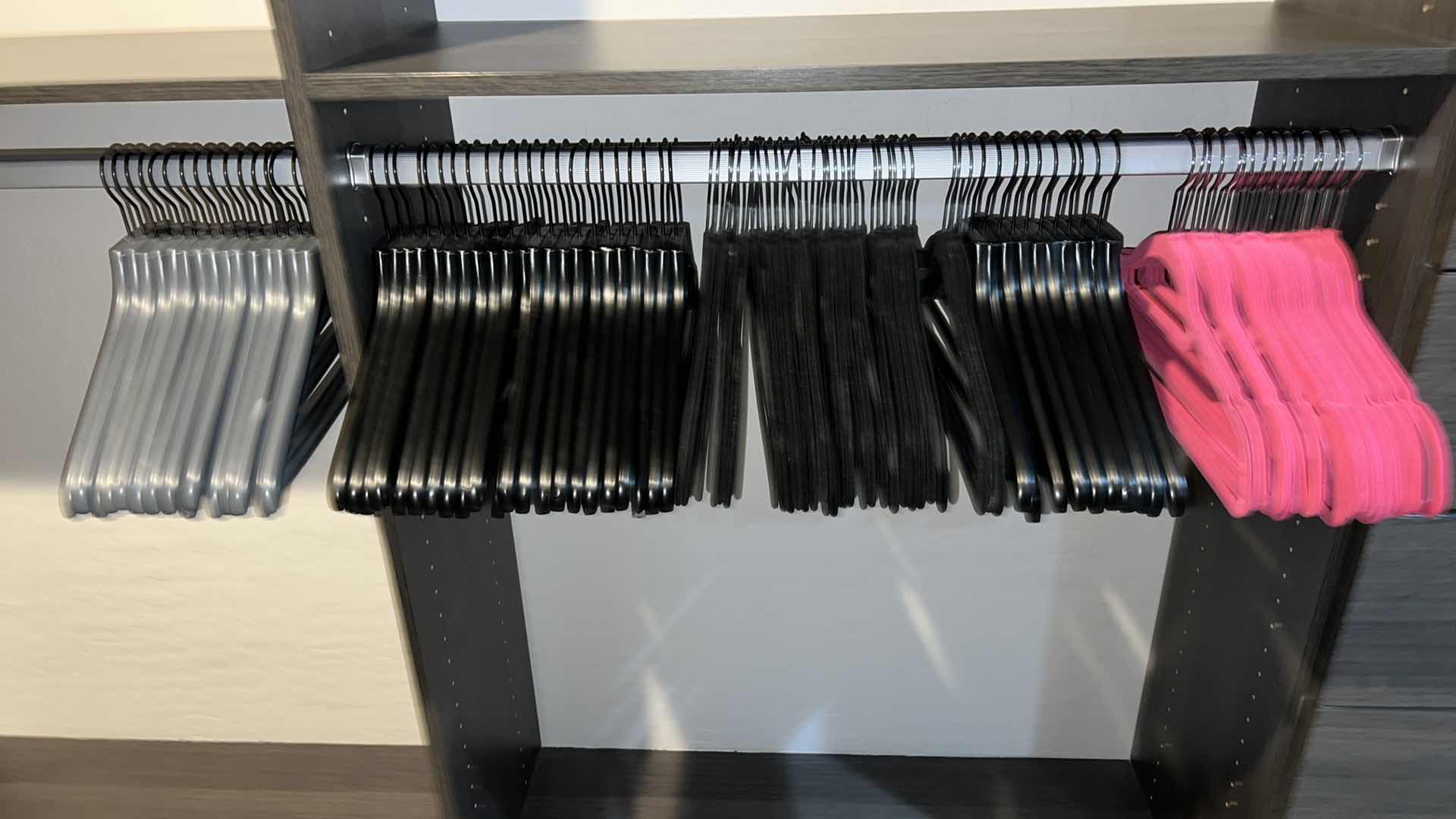 Photo 1 of ASSORTED CLOTHES HANGERS