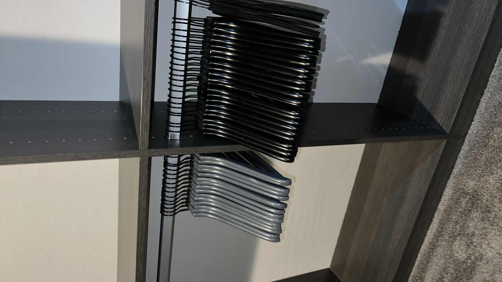 Photo 1 of ASSORTED CLOTHES HANGERS