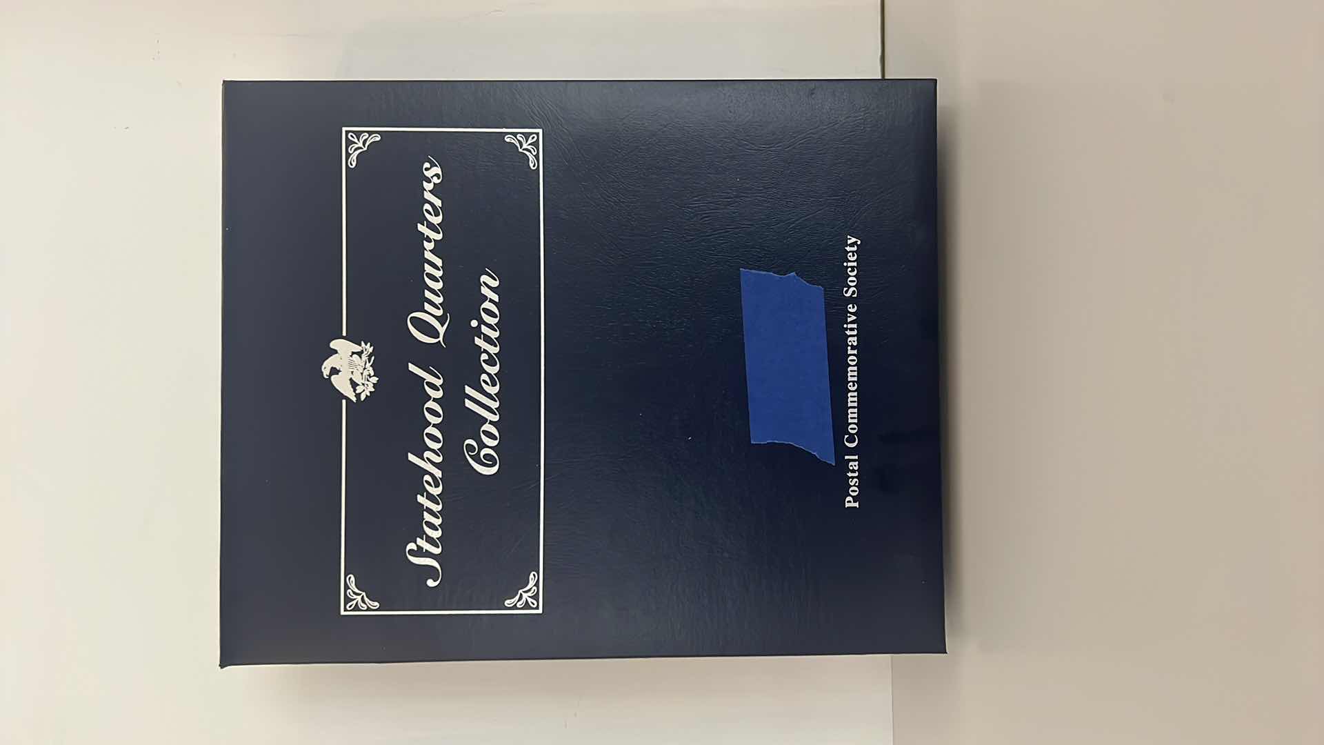 Photo 1 of STATEHOOD QUARTERS COLLECTION POSTAL COMMEMORATIVE SOCIETY BINDER