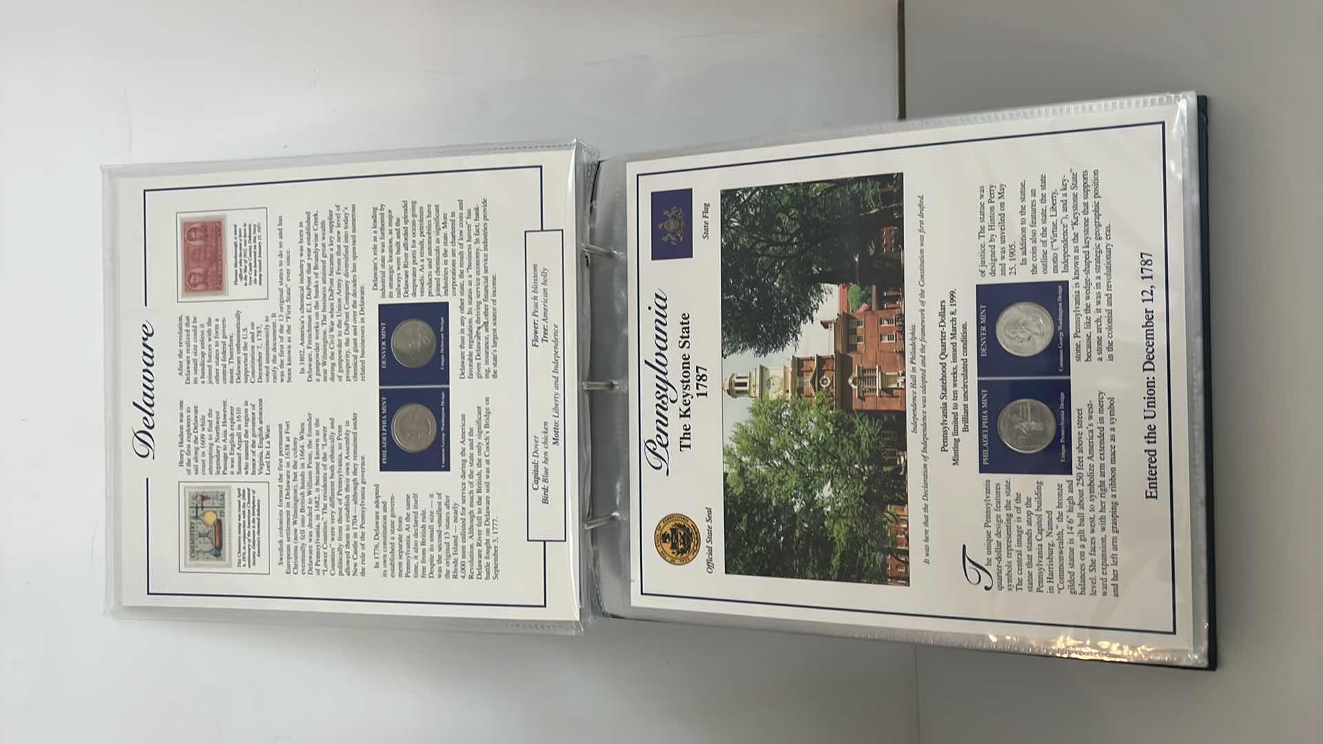 Photo 1 of STATEHOOD QUARTERS COLLECTION POSTAL COMMEMORATIVE SOCIETY BINDER