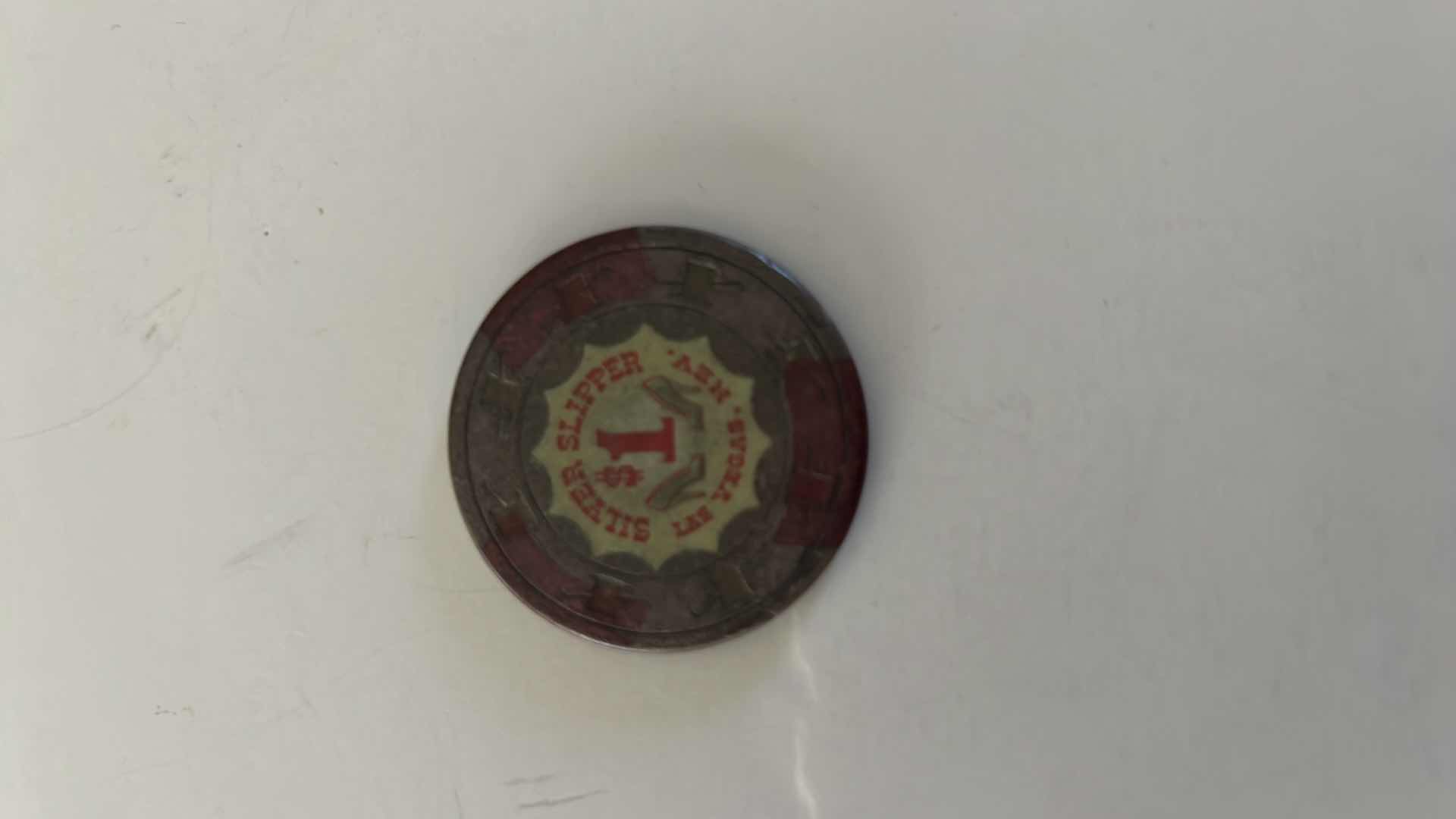 Photo 1 of VINTAGE SILVER SLIPPER $1 CASINO CHIP