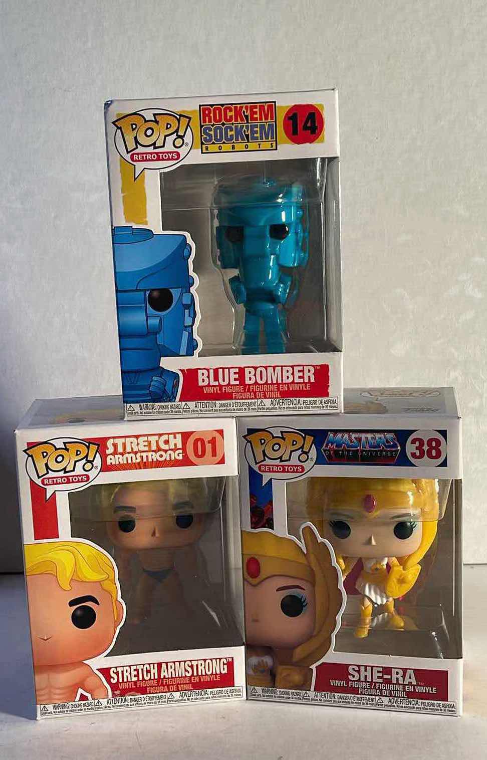 Photo 1 of NIB FUNKO POP RETRO TOYS SERIES “BLUE BOMBER, SHE-RA & STRETCH ARMSTRONG” - TOTAL RETAIL PRICE $43.99