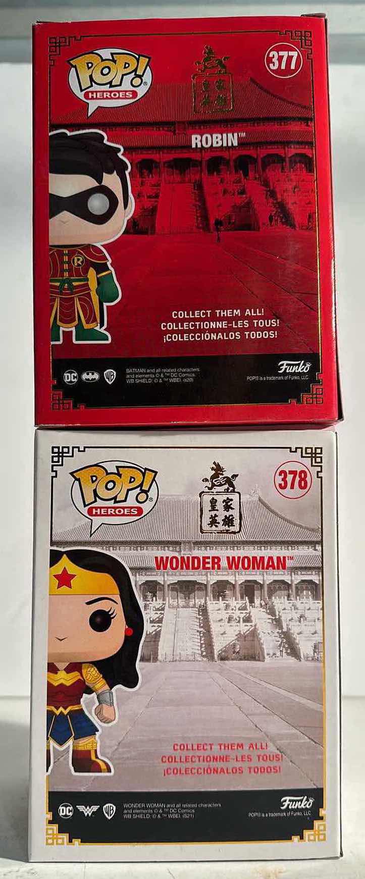 Photo 1 of NIB FUNKO POP HEROS “WONDER WOMAN, ROBIN”TOTAL RETAIL PRICE $25.00