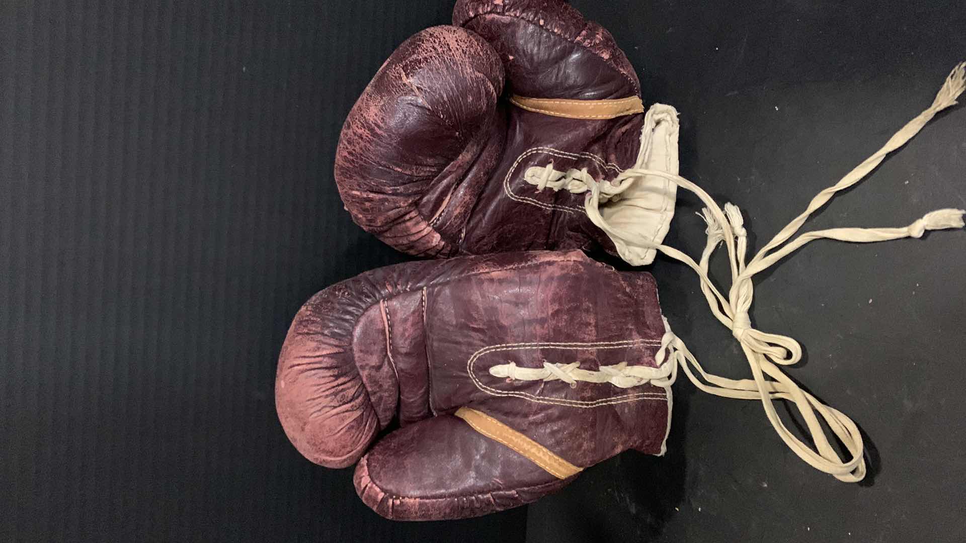Photo 1 of VINTAGE LEATHER BOXING GLOVES, METAL ROLLER SKATES
