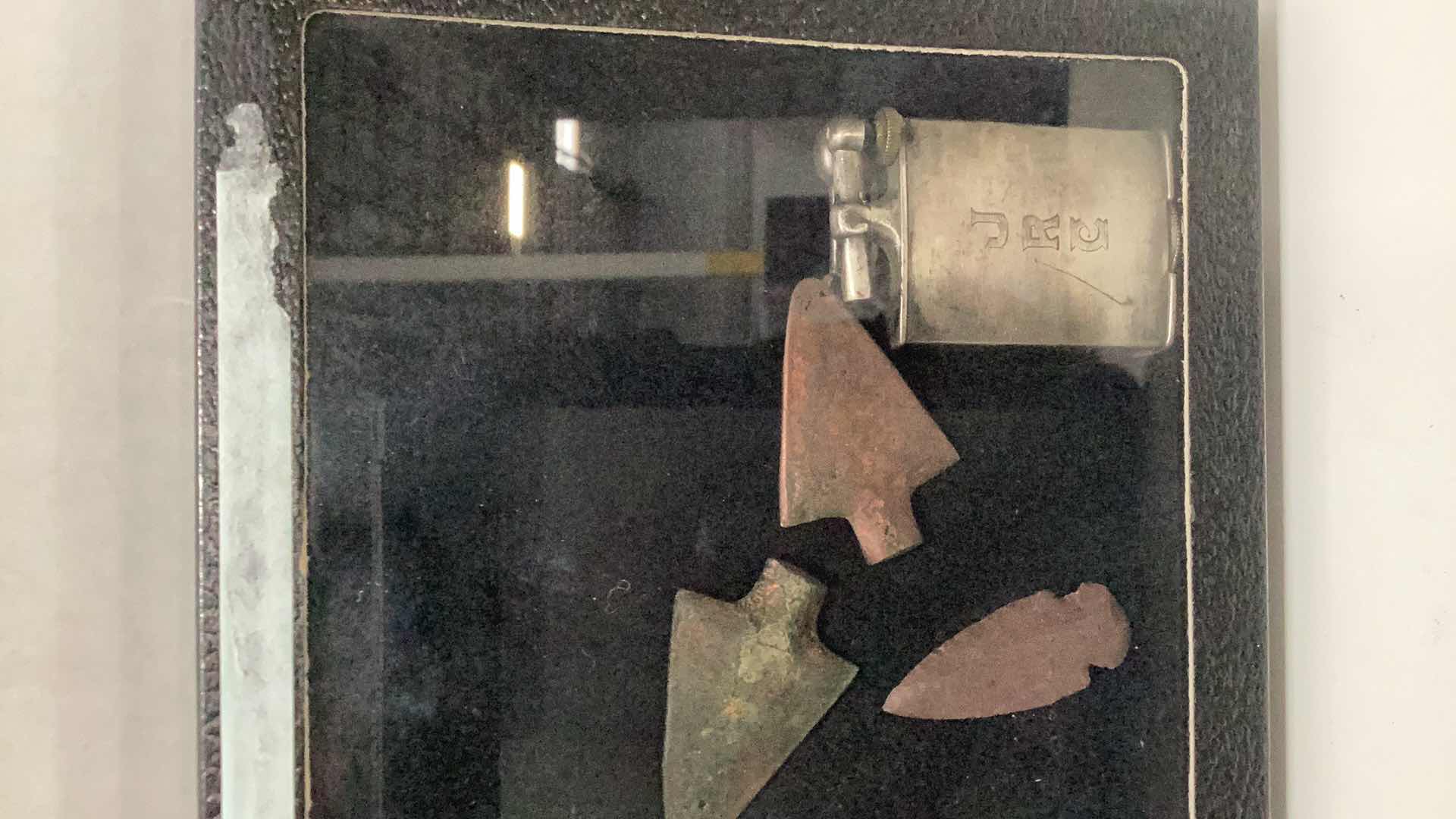 Photo 1 of VINTAGE METAL AND STONE ARROWHEADS AND VINTAGE LIGHTER, CASE 8” X 6”