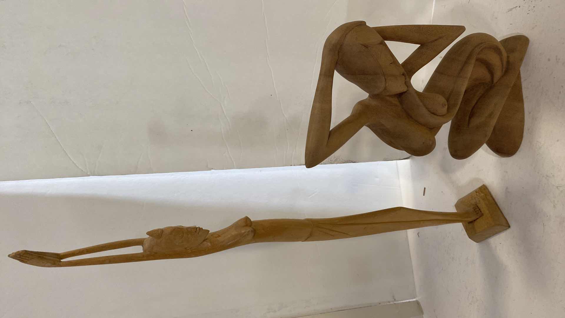 Photo 1 of PAIR OF WOOD SCULPTURES TALLEST 21”