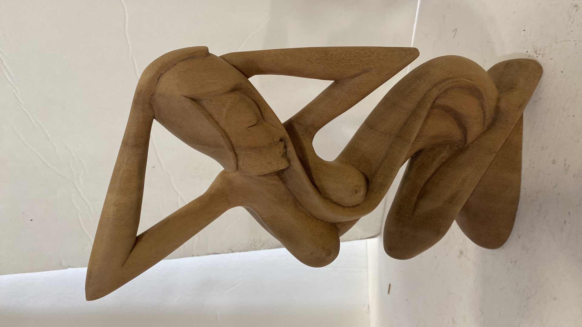 Photo 1 of PAIR OF WOOD SCULPTURES TALLEST 21”