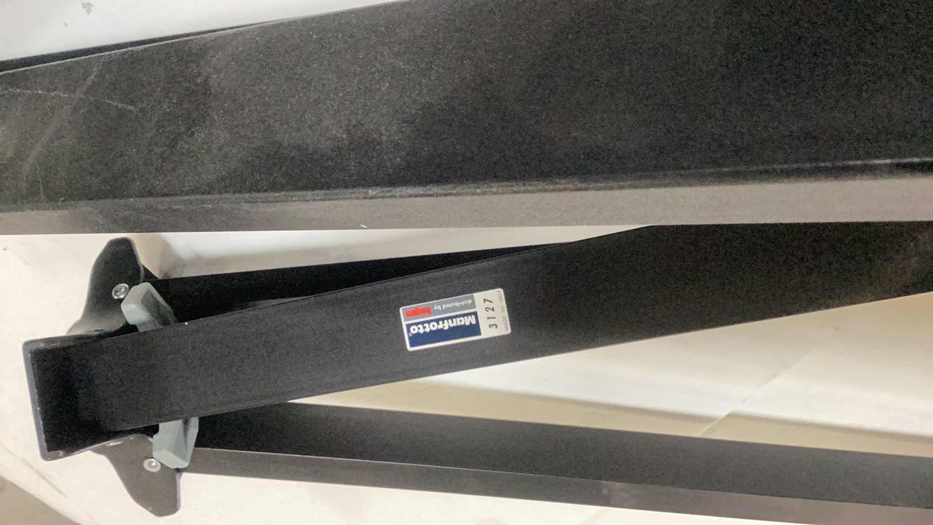 Photo 1 of TWO MANFROTTO MADE IN ITALY TRIPODS WITH WHEELS