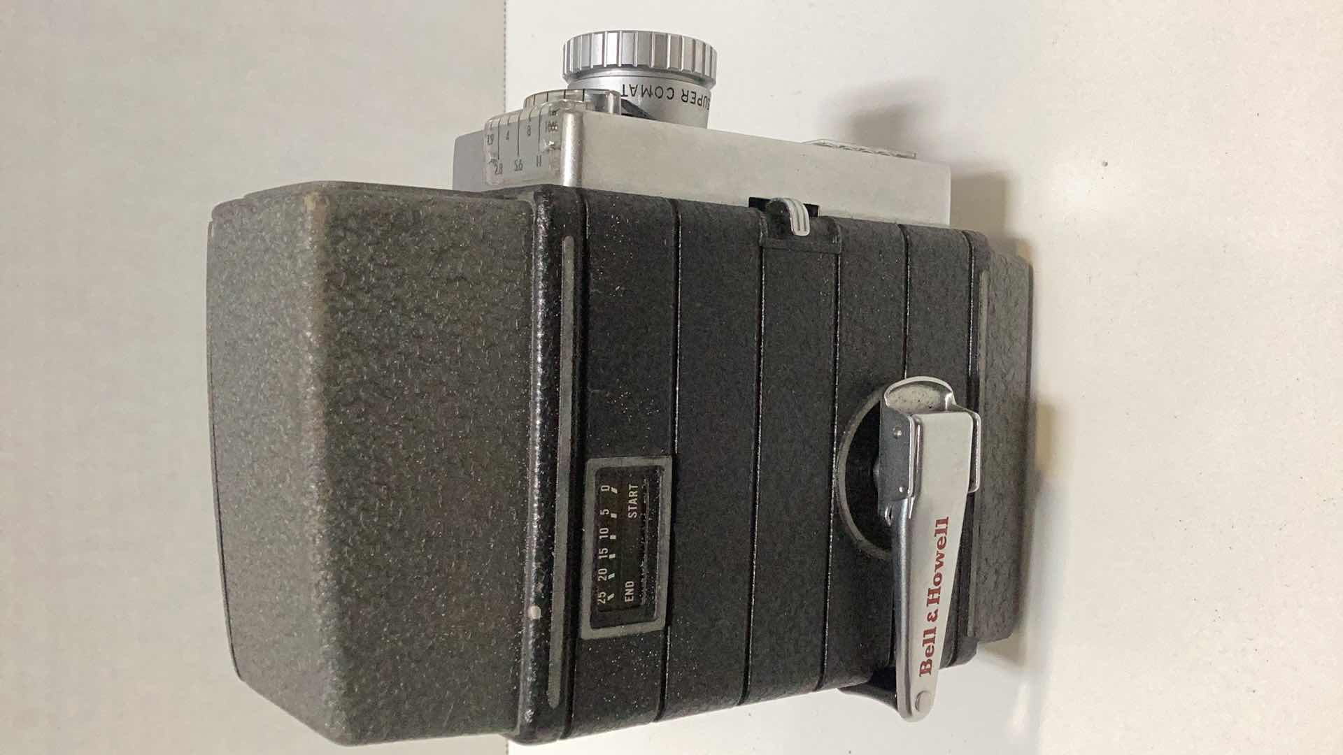 Photo 1 of THREE VINTAGE MOVIE CAMERAS: CANON, BELL & HOWELL, AND A KODAK