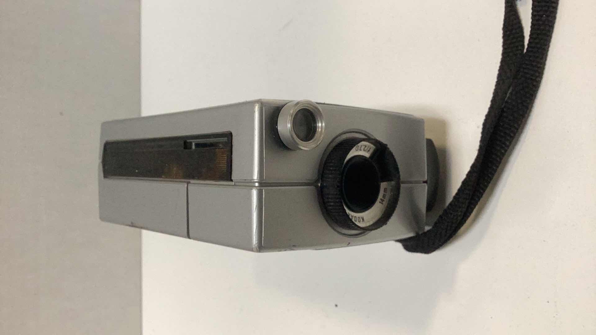 Photo 1 of THREE VINTAGE MOVIE CAMERAS: CANON, BELL & HOWELL, AND A KODAK