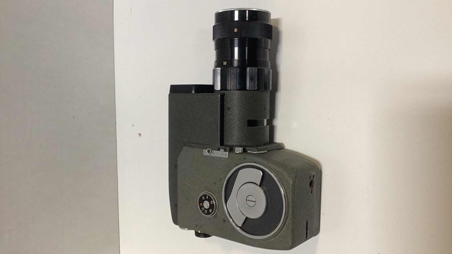 Photo 1 of THREE VINTAGE MOVIE CAMERAS: CANON, BELL & HOWELL, AND A KODAK