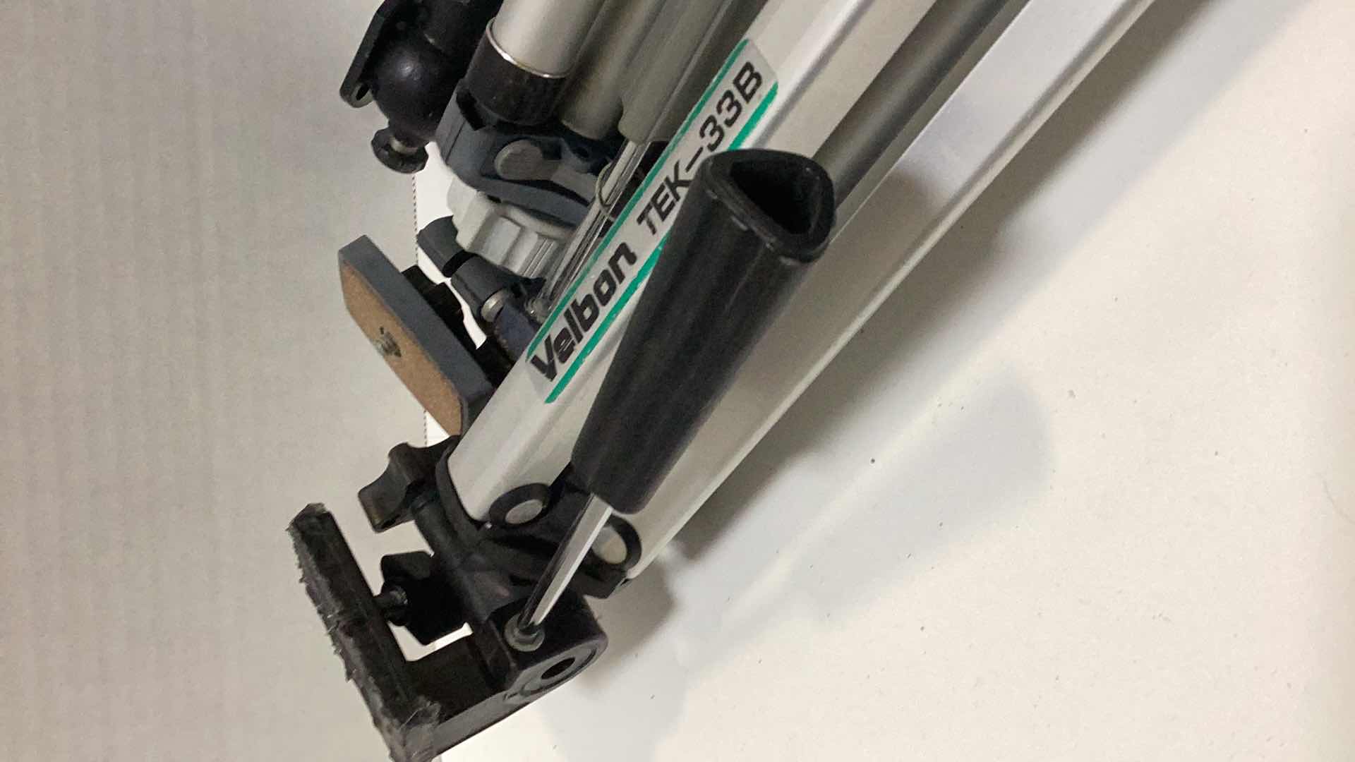 Photo 1 of THREE CAMERA TRIPODS