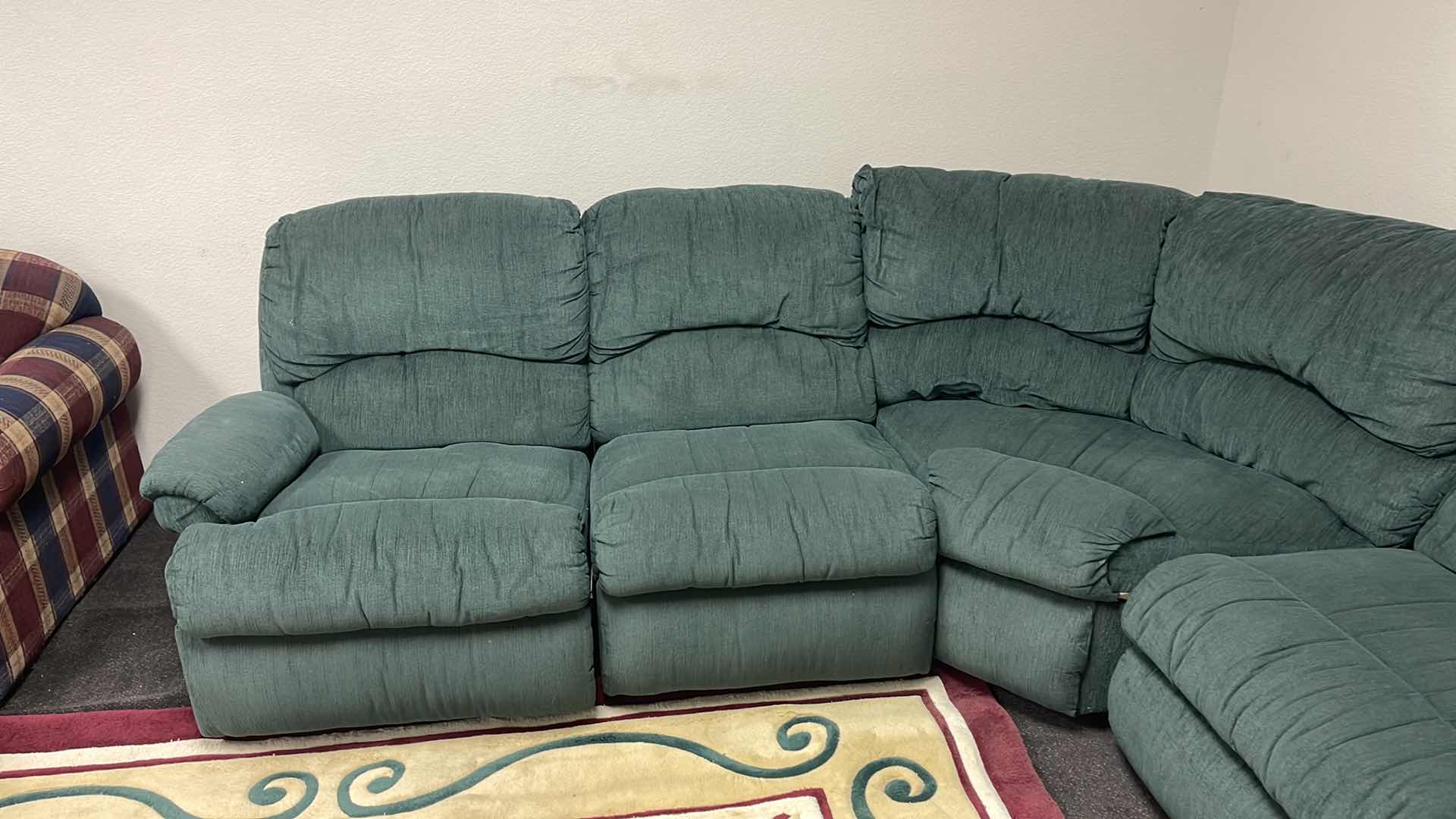 Photo 1 of GREEN SECTIONAL RECLINING SOFA 125” X 95”