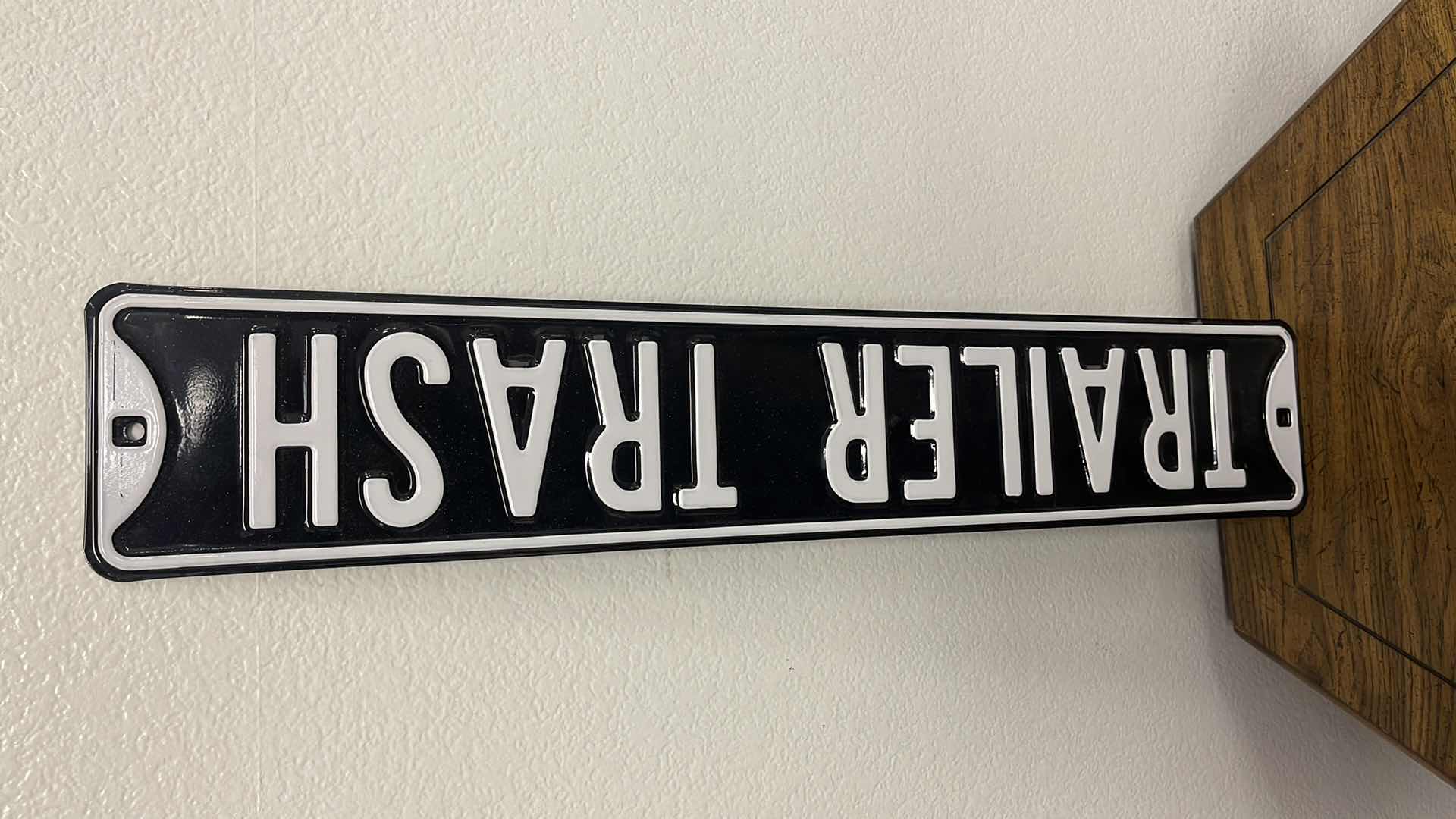 Photo 1 of MEDAL “TRAILER TRASH” SIGN 32” X 6”