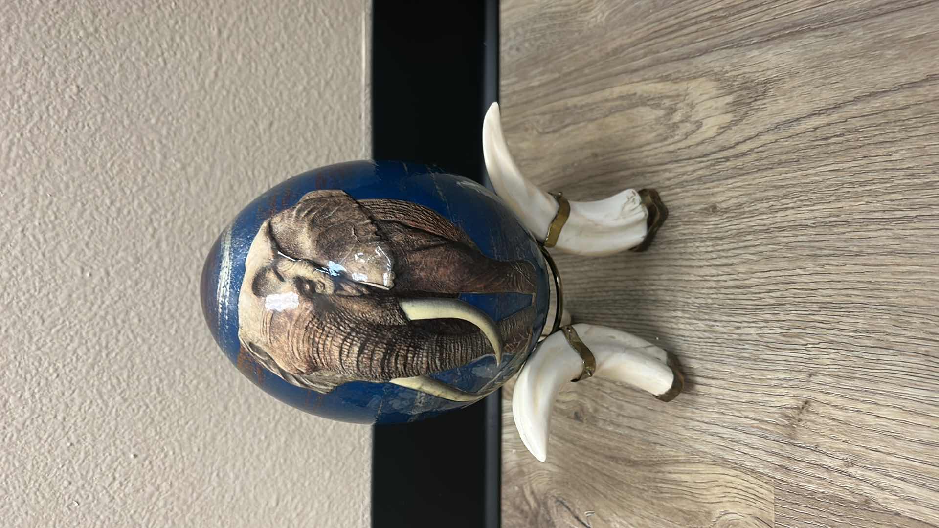 Photo 1 of OSTRICH EGG ON TUSK STAND ( HEIGHT WITH STAND 10”)