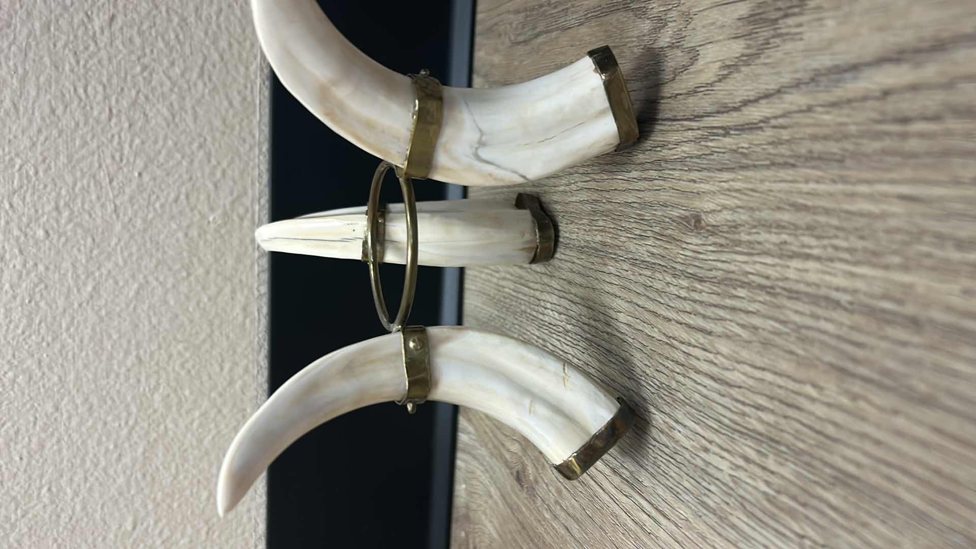 Photo 1 of OSTRICH EGG ON TUSK STAND ( HEIGHT WITH STAND 10”)