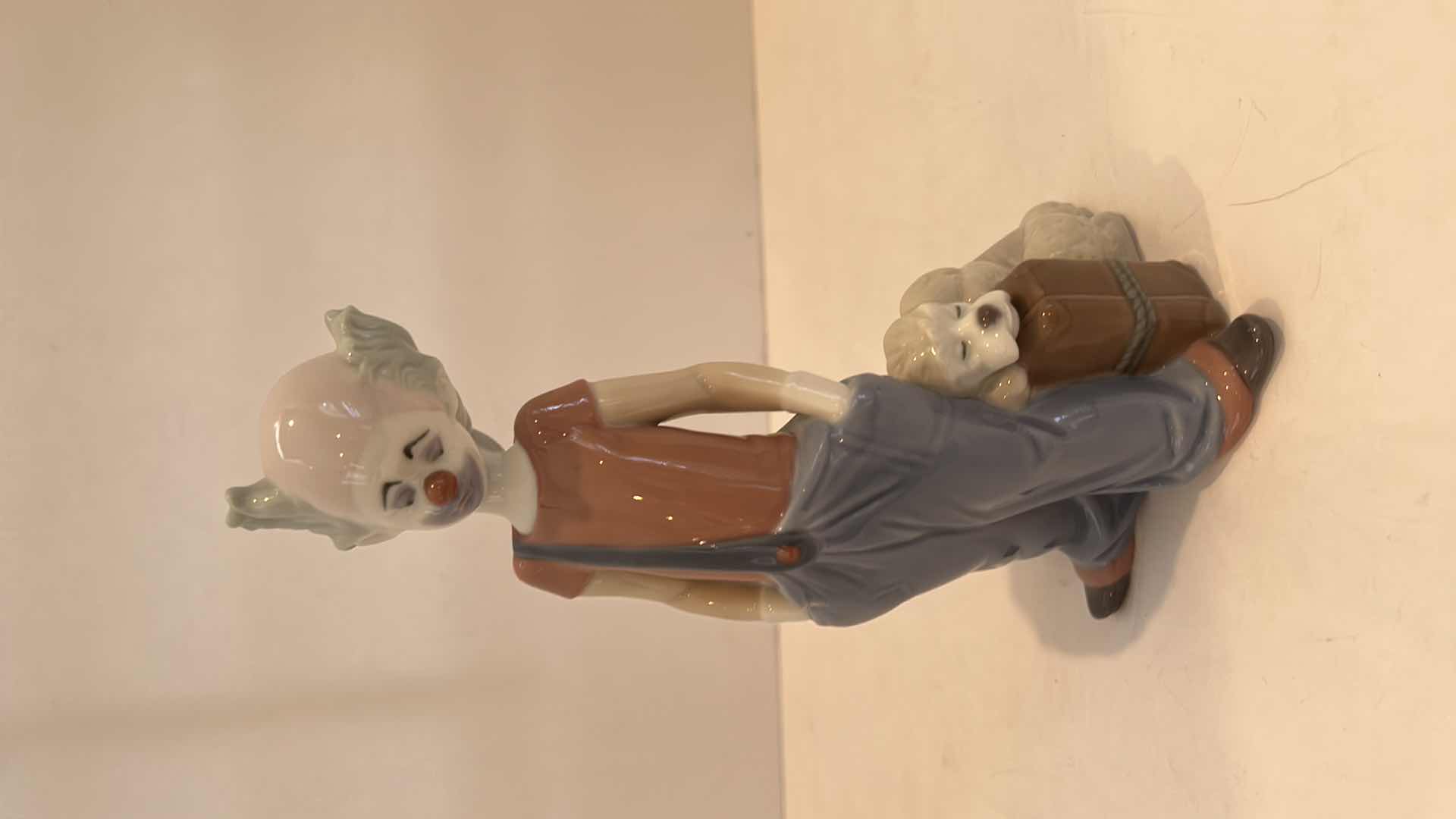 Photo 1 of LLADRO 8” PORCELAIN FIGURINE - CLOWN “DESTINATION BIG TOP”