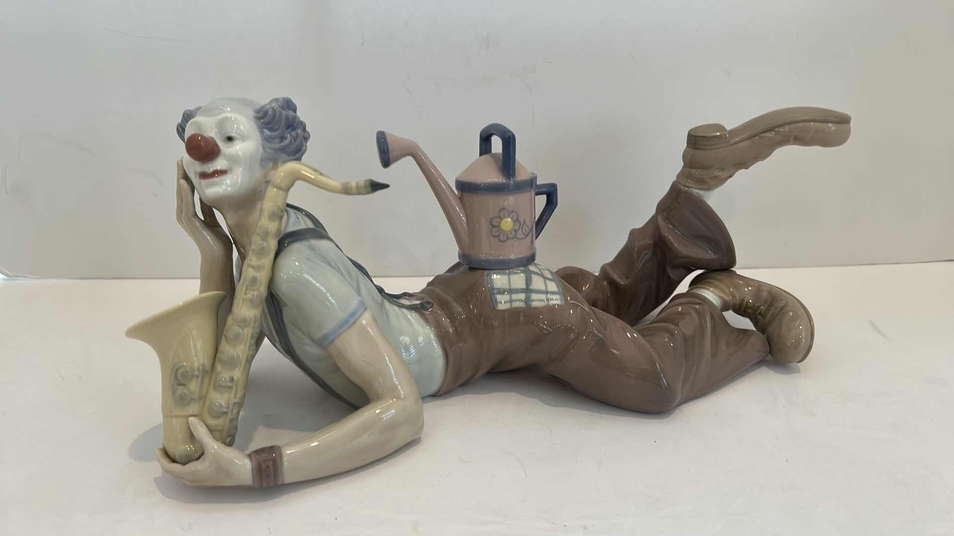 Photo 1 of RARE LLADRO "RECLINING CLOWN W. SAXAPHONE" PORCELAIN FIGURINE - L12"
