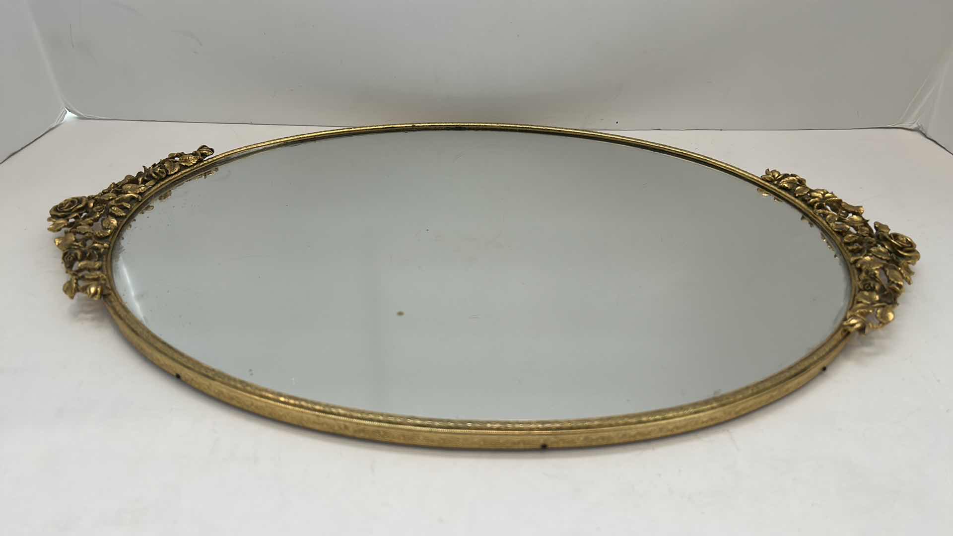 Photo 1 of VINTAGE BRASS FRAMED MIRROR W FELT BOTTOM FOR TOP OF DRESSER OR VANITY 18.5” x 11”