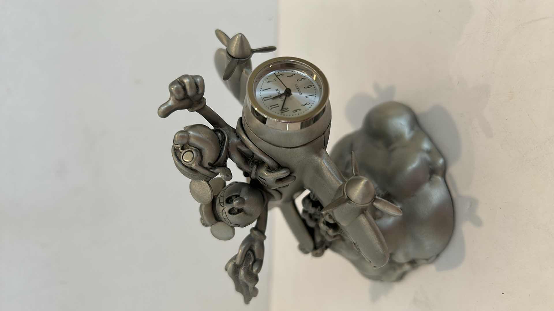View 2 of Disney Speed of Light Mickey Mouse Linden Pewter Airplane Clock