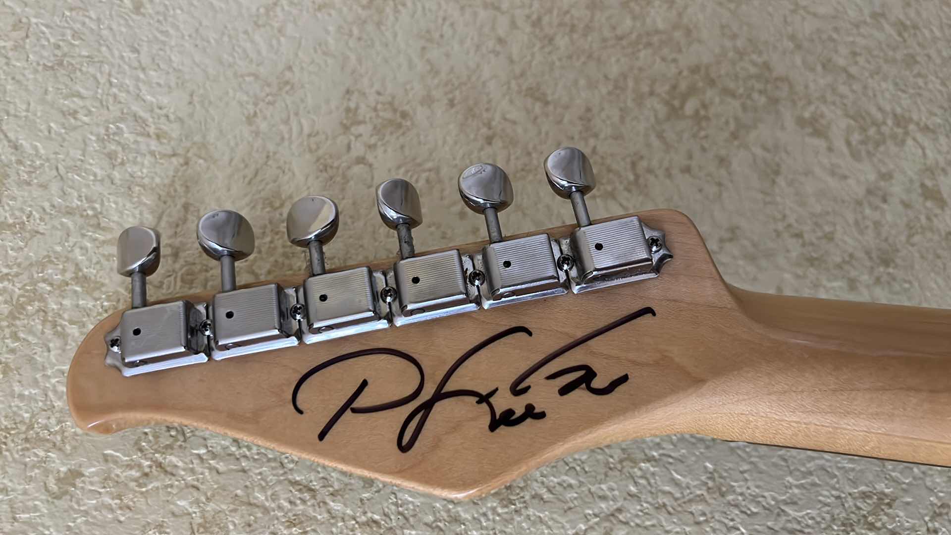 Photo 1 of GIGLIOTTI SIGNED PEARL WHITE ELECTRIC GUITAR W COA