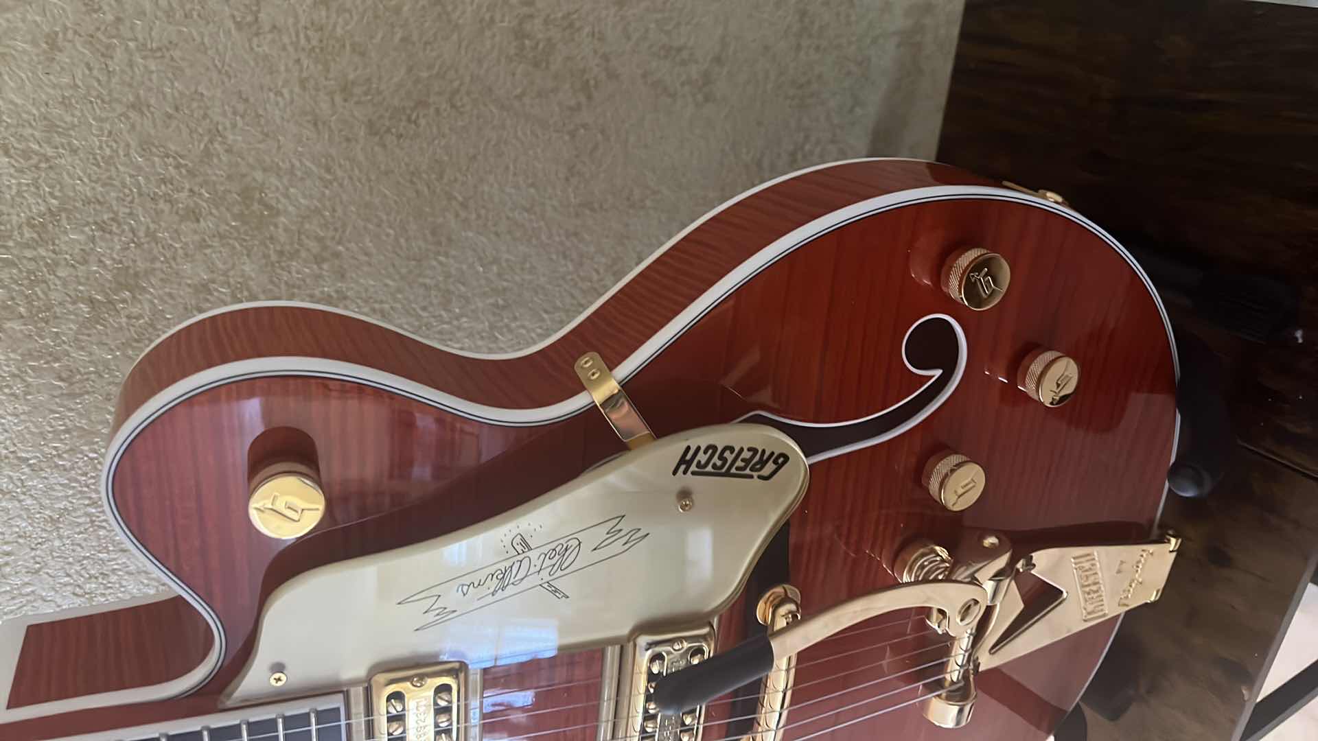 Photo 4 of GRETSCH  PLAYERS EDITION NASHVILLE BY BIGSBY “CHET ATKINS” SIGNED FLAME MAPLE ORANGE STAIN GUITAR W. COA & ACCESSORIES