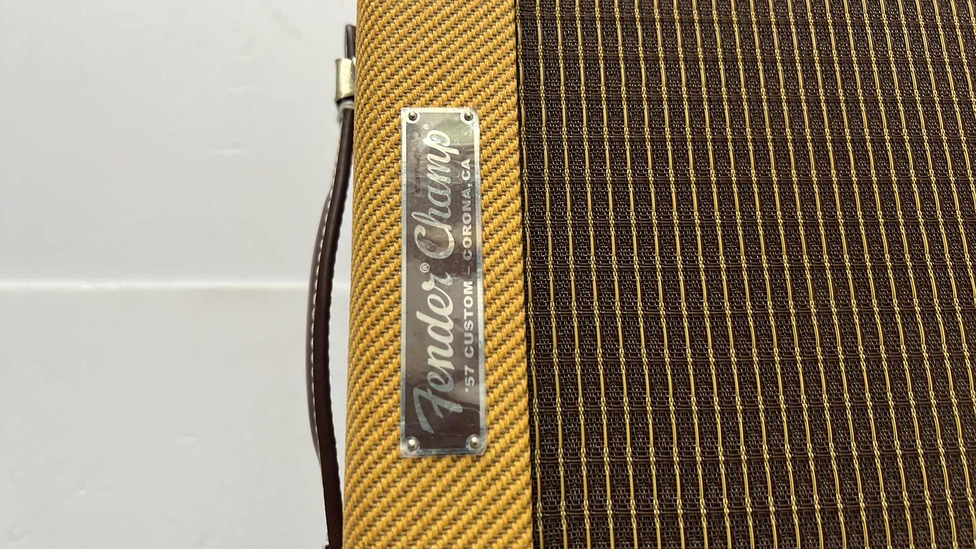 Photo 8 of FENDER '57 CUSTOM CHAMP TUBE GUITAR AMP W LACQUERED TWEED  (13.5” x 7” H12”)