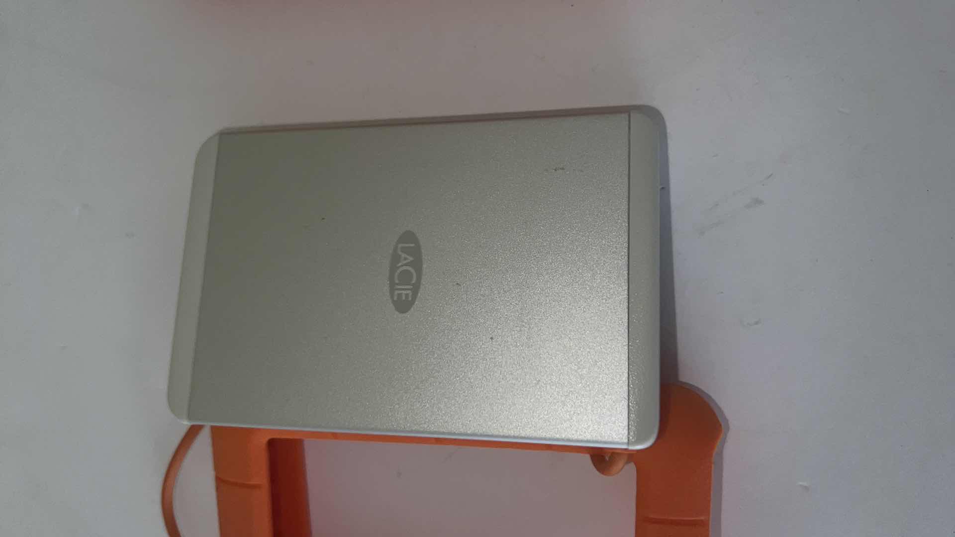 Photo 1 of 2- LaCie RUGGED MINI EXTERNAL HARD DRIVE PORTABLE HDD W ORANGE CASES
