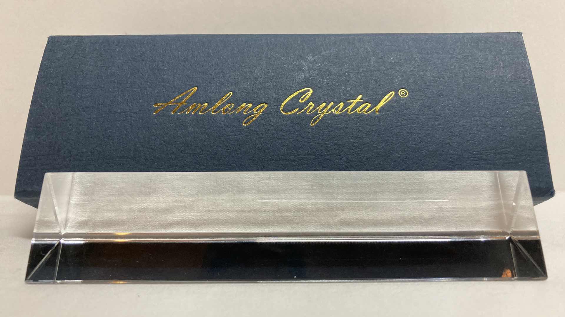 Photo 1 of AMLONG CRYSTAL OPTICAL GLASS TRIANGULAR PRISM W CASE 6” X 1.25” H1.25”