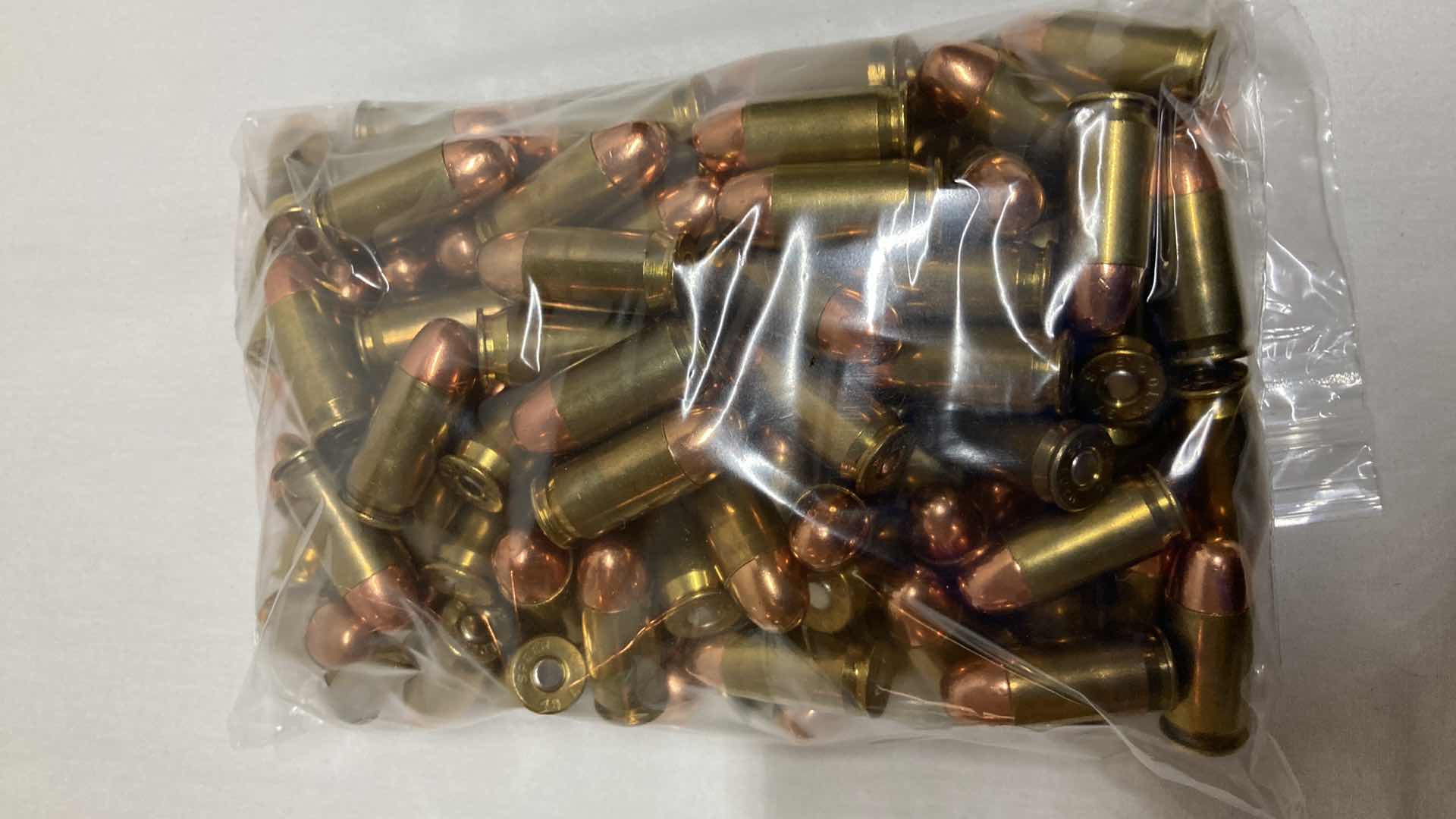 Photo 1 of WASHOUGAL RIVER CARTRIDGE COMPANY 45 ACP 230GR TMJ BRASS CASE AMMO RELOADS (131RDS)