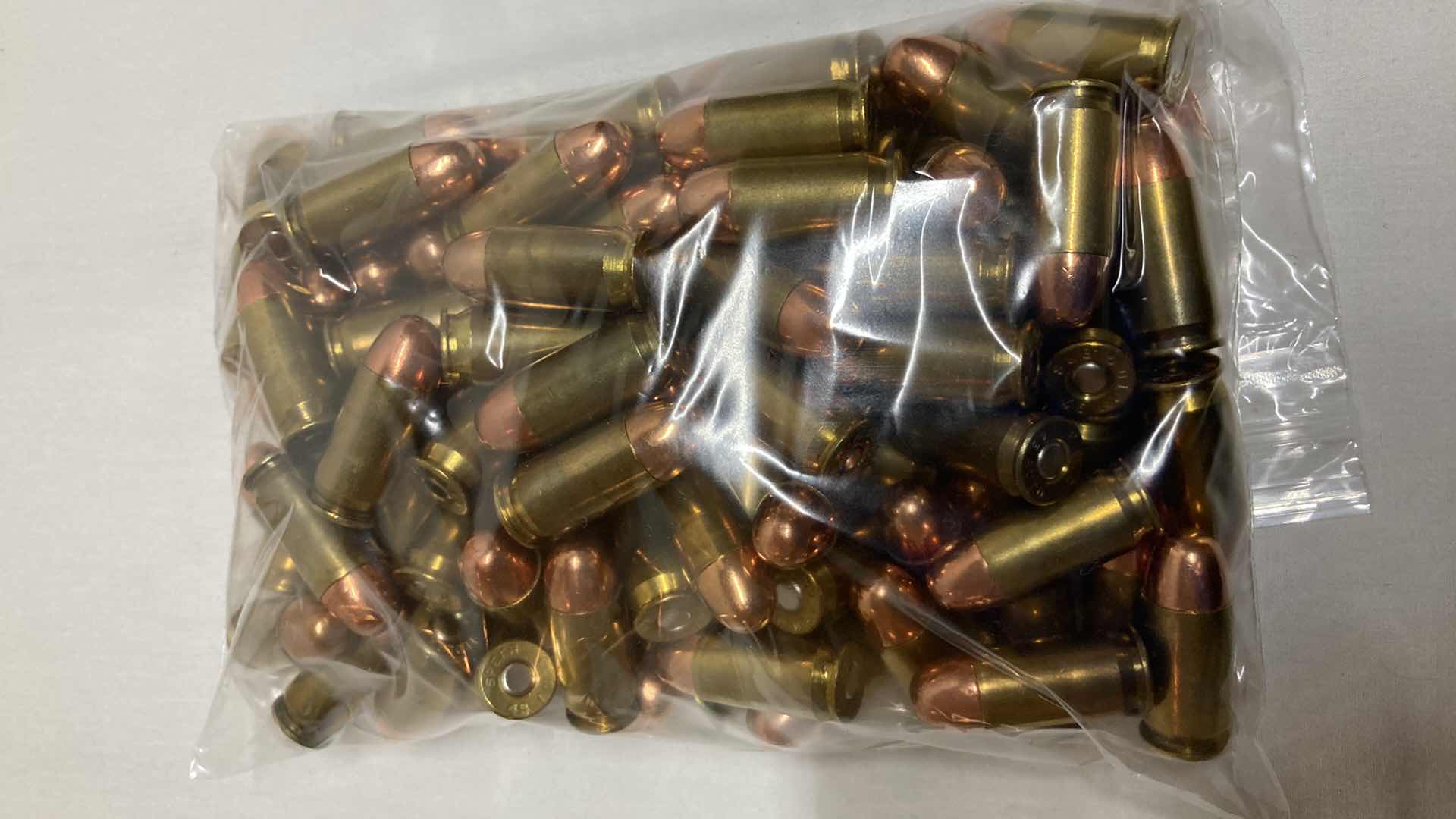 Photo 1 of WASHOUGAL RIVER CARTRIDGE COMPANY 45 ACP 230GR TMJ BRASS CASE AMMO RELOADS (131RDS)