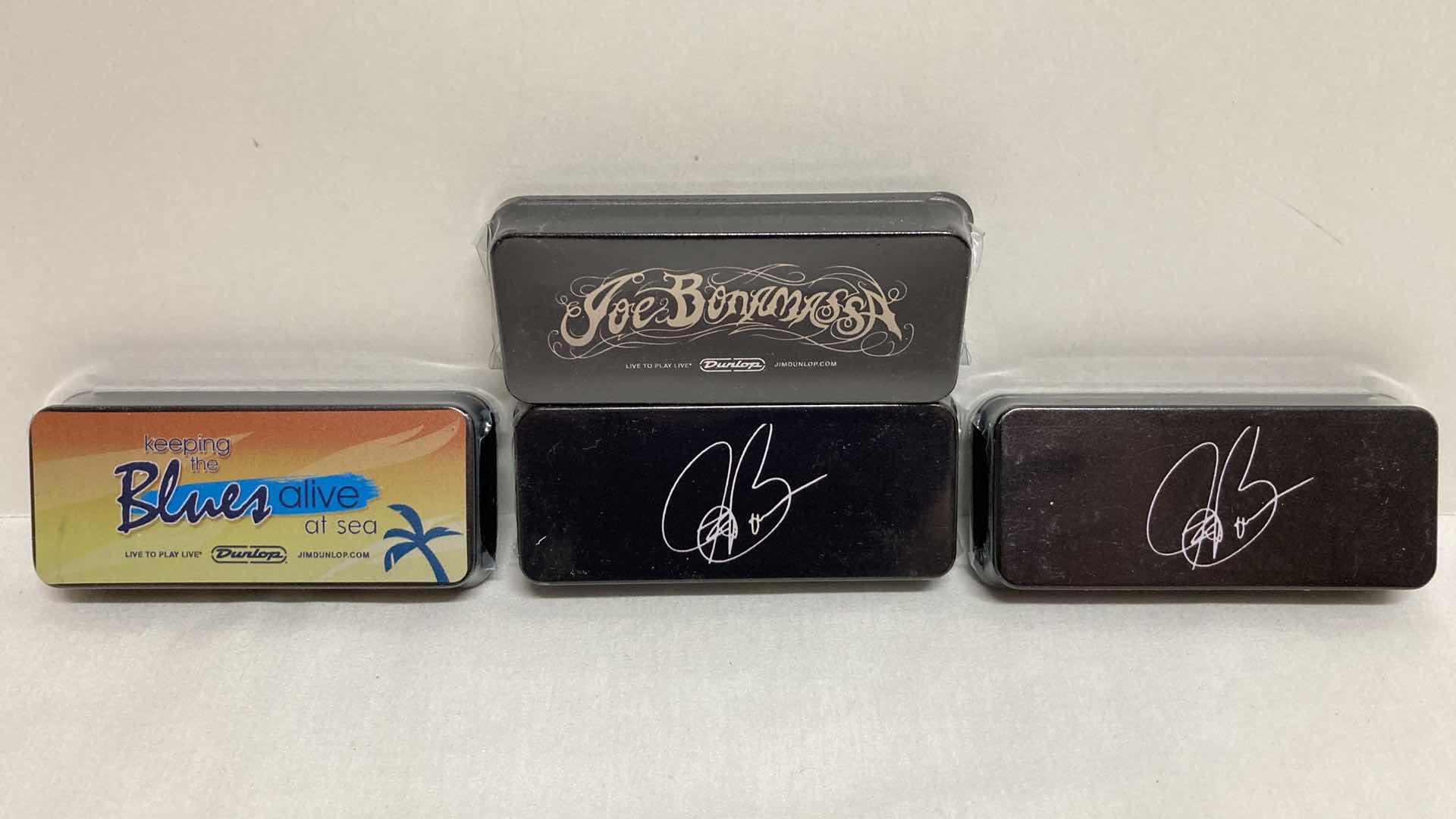 Photo 1 of NEW JOE BONAMASSA PICK TINS W PICKS (4) 1.5” X 3.5” H0.5”