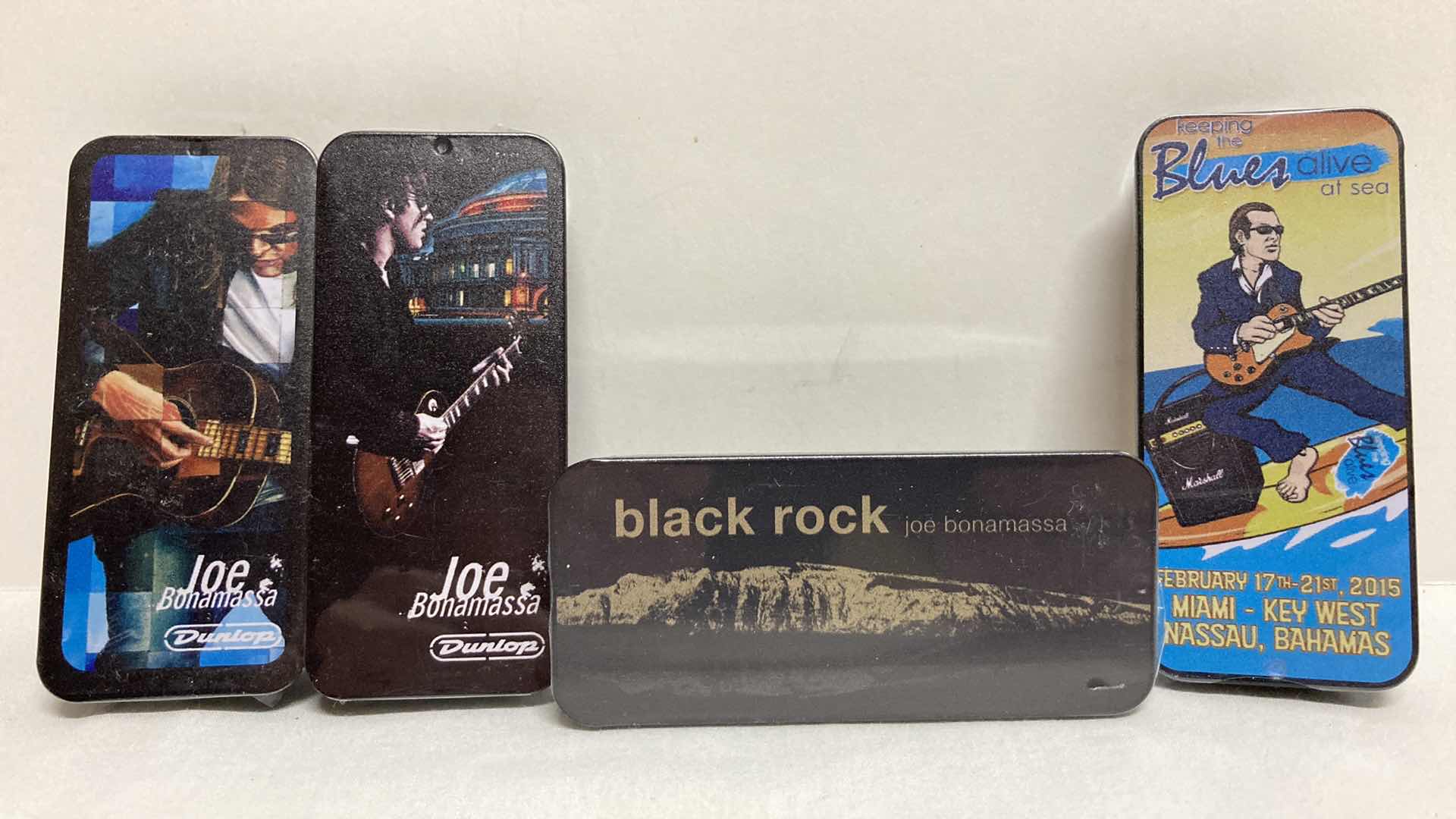 Photo 1 of NEW JOE BONAMASSA PICK TINS W PICKS (4) 1.5” X 3.5” H0.5”