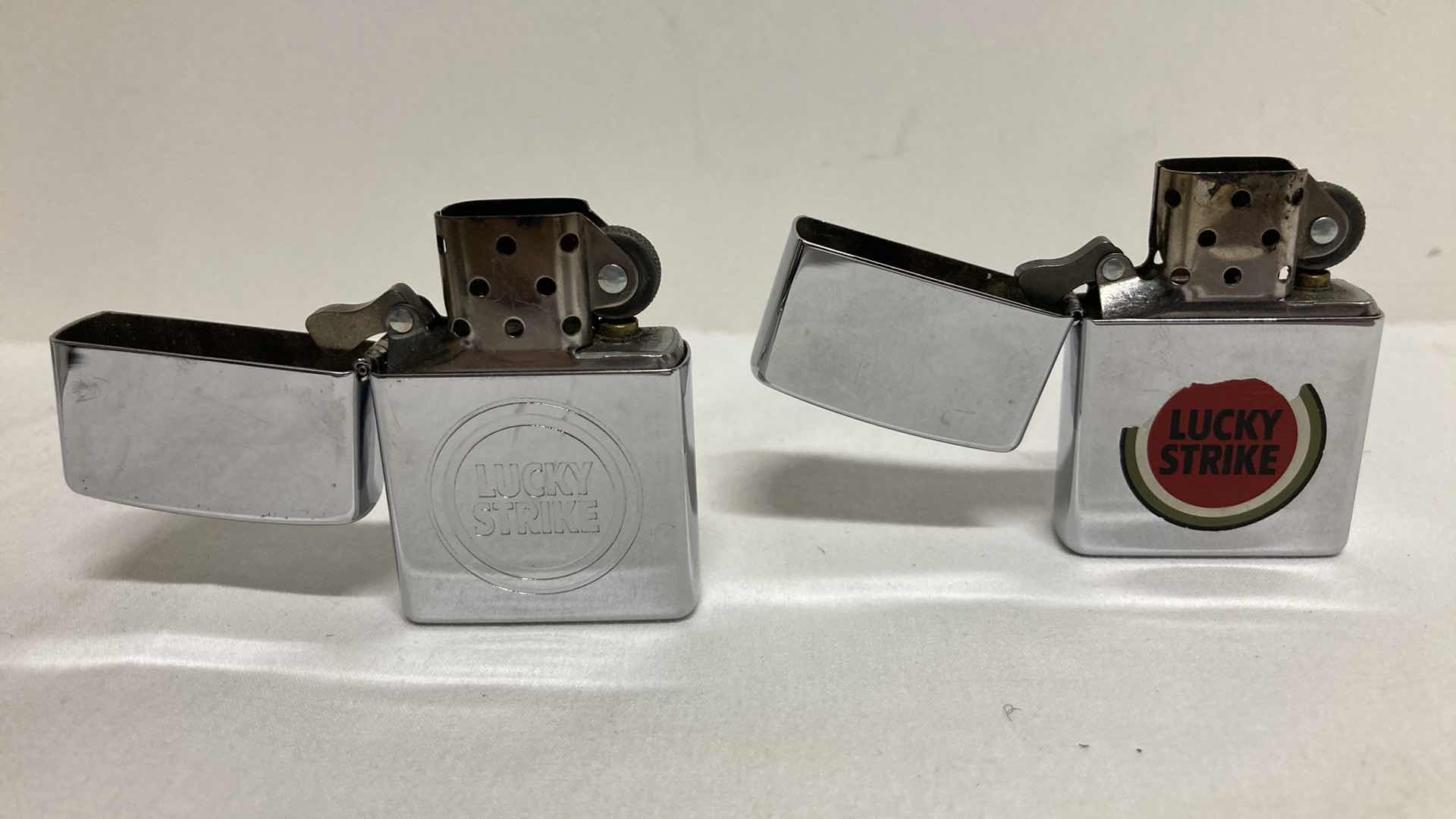 Photo 1 of VINTAGE ZIPPO LUCKY STRIKE LIGHTER W CASE & ZIPPO LUCKY STRIKE LIGHTER