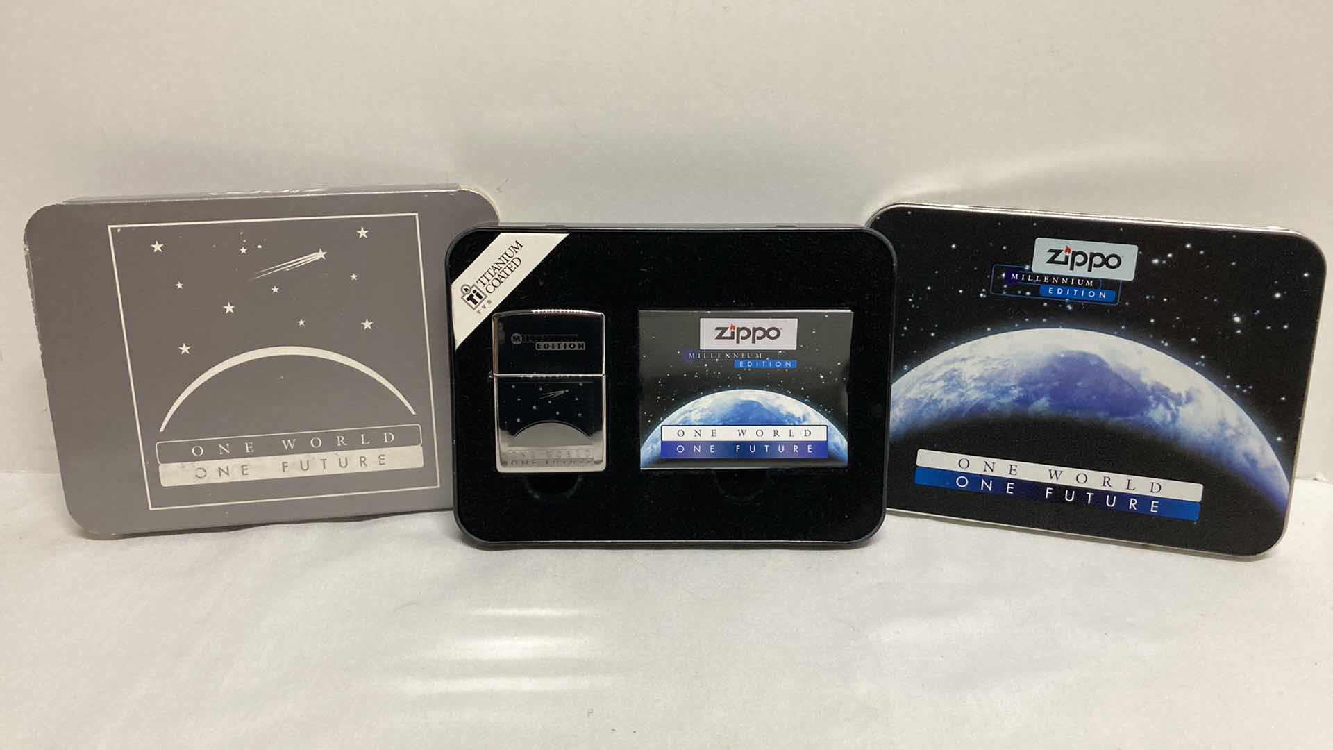 View 1 of ZIPPO MILLENNIUM EDITION ONE WORLD ONE FUTURE TITANIUM COATED LIGHTER W CASE