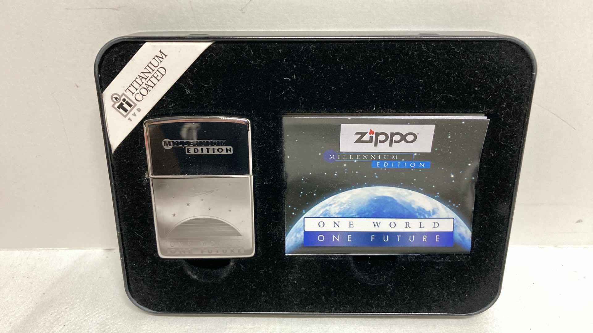 View 2 of ZIPPO MILLENNIUM EDITION ONE WORLD ONE FUTURE TITANIUM COATED LIGHTER W CASE
