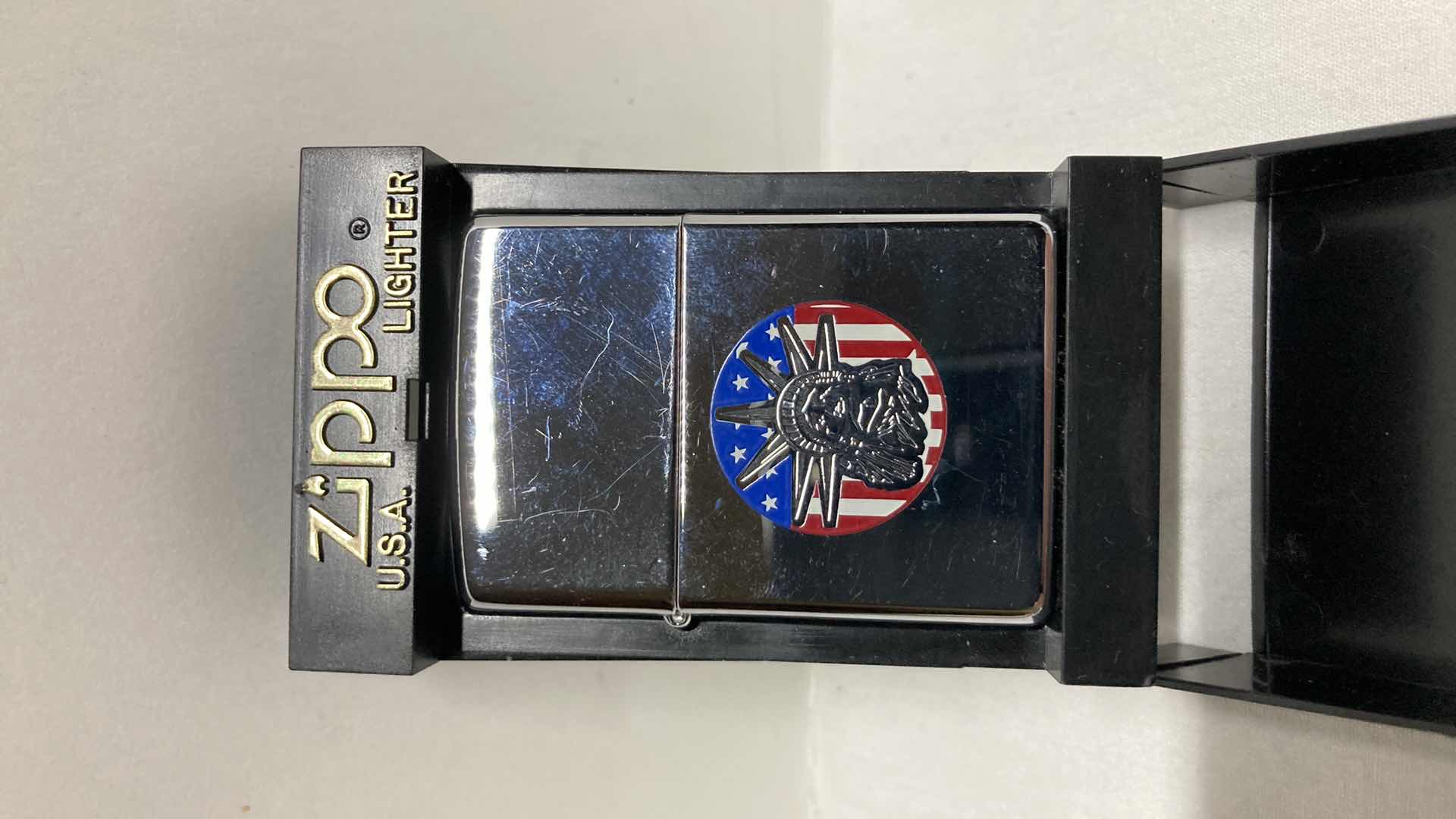 Photo 1 of ZIPPO LIBERTY LIGHTER W CASE