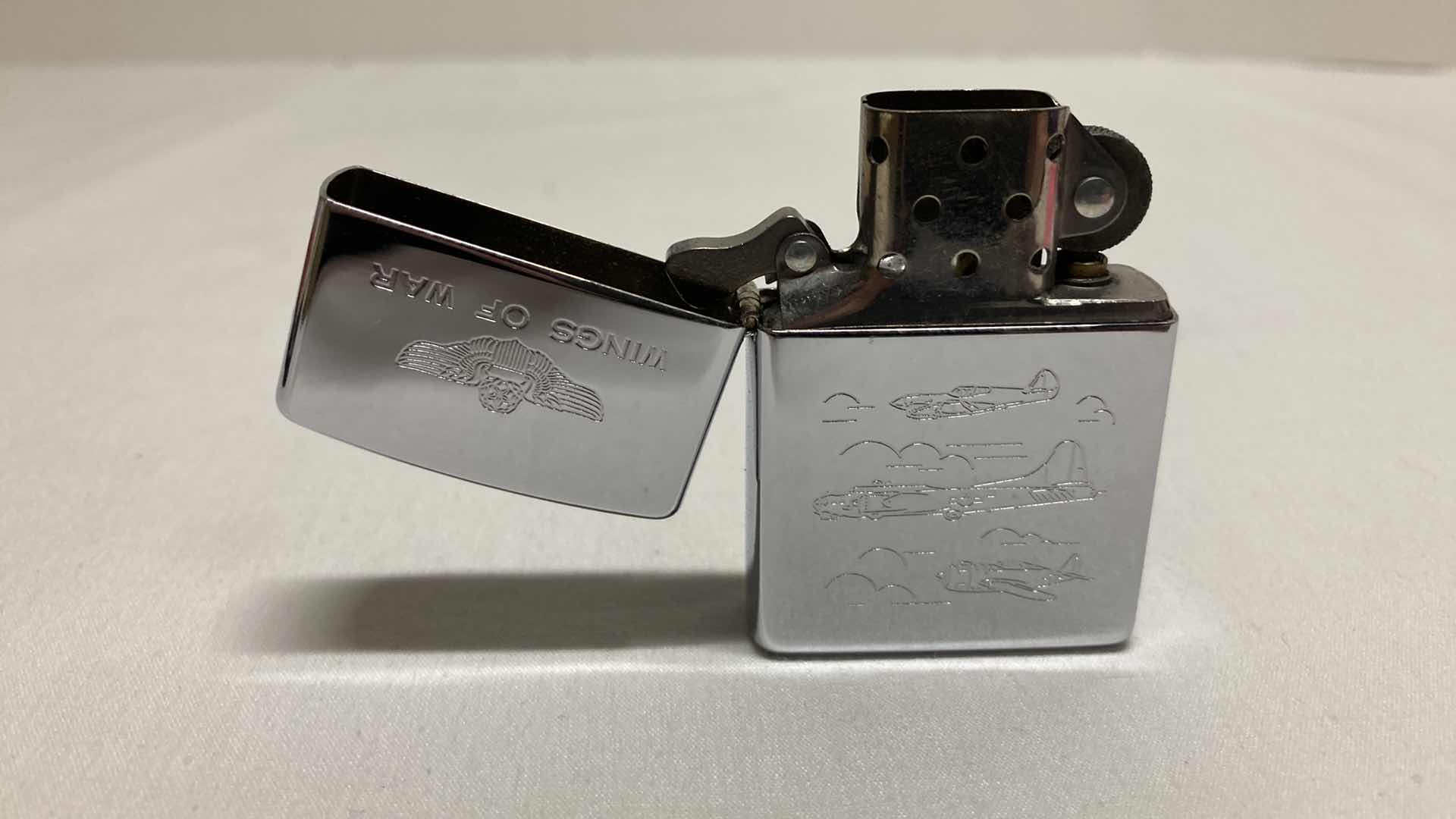 Photo 1 of ZIPPO WINGS OF WAR LIGHTER W CASE