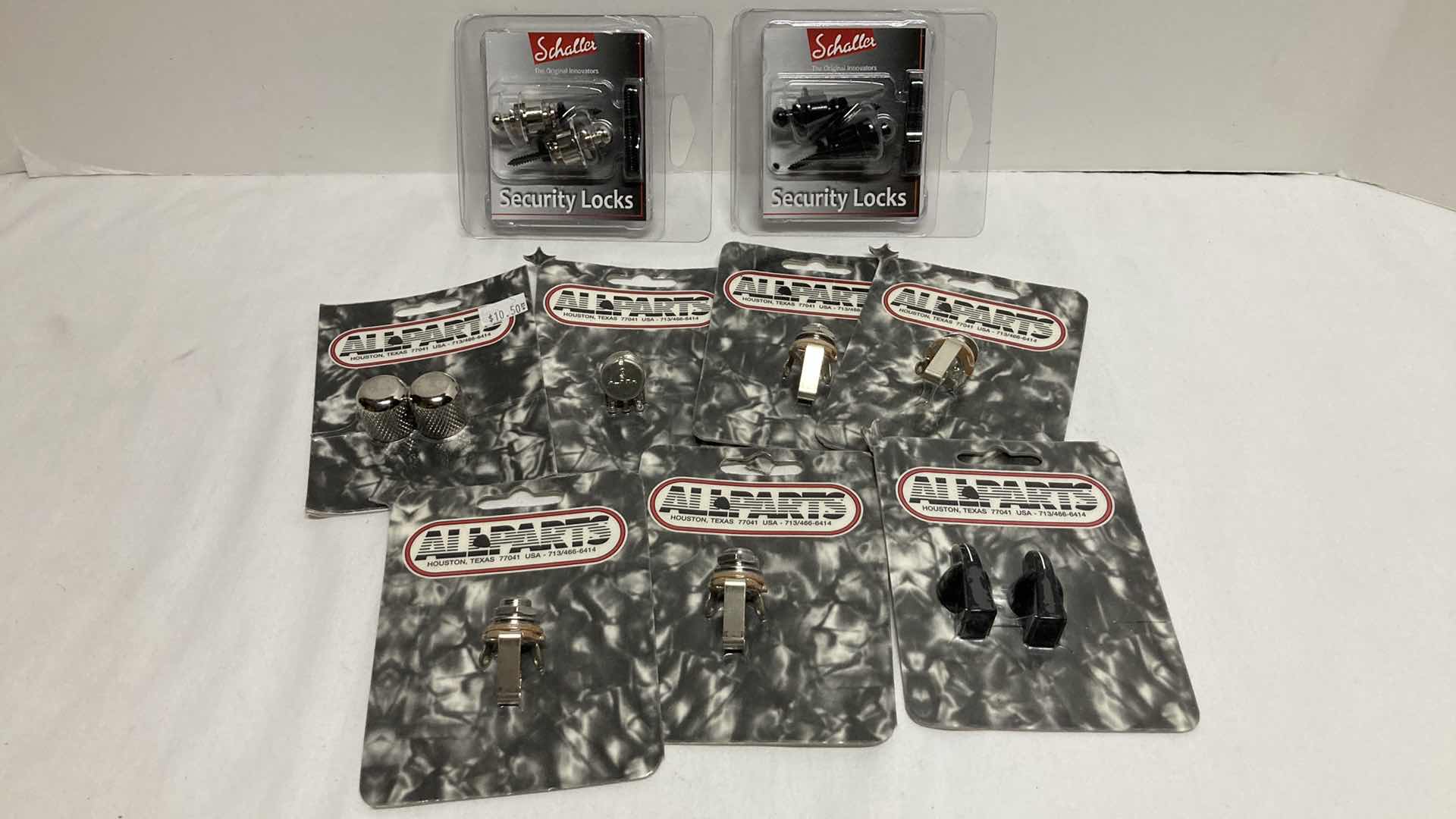 Photo 1 of NEW SCHALLER SECURITY STRAP LOCKS (2) W NEW ALL PARTS KNOBS & JACK SWITCHCRAFTS (7)