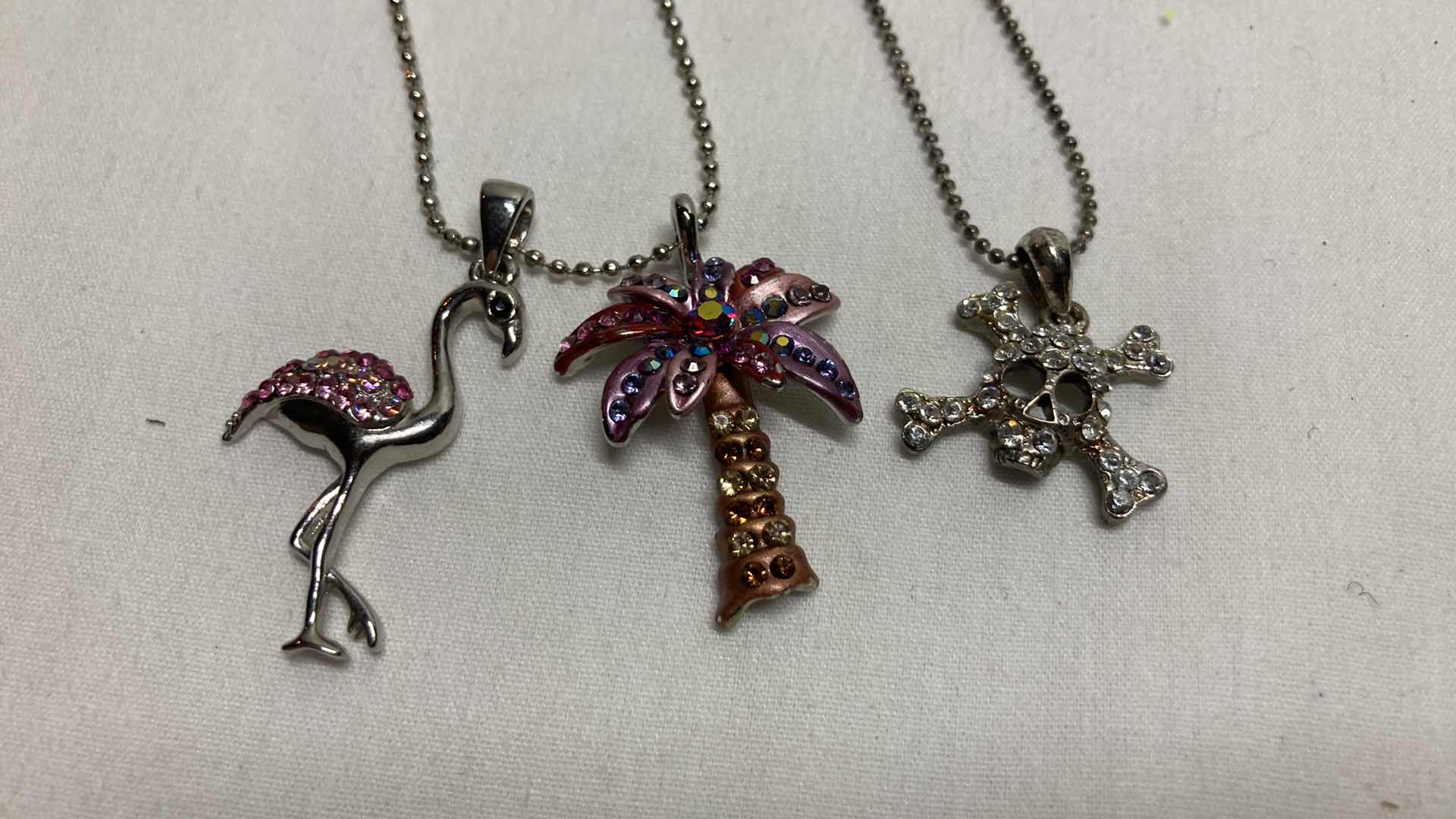 Photo 1 of COSTUME NECKLACES W JEWELED CHARMS (5)