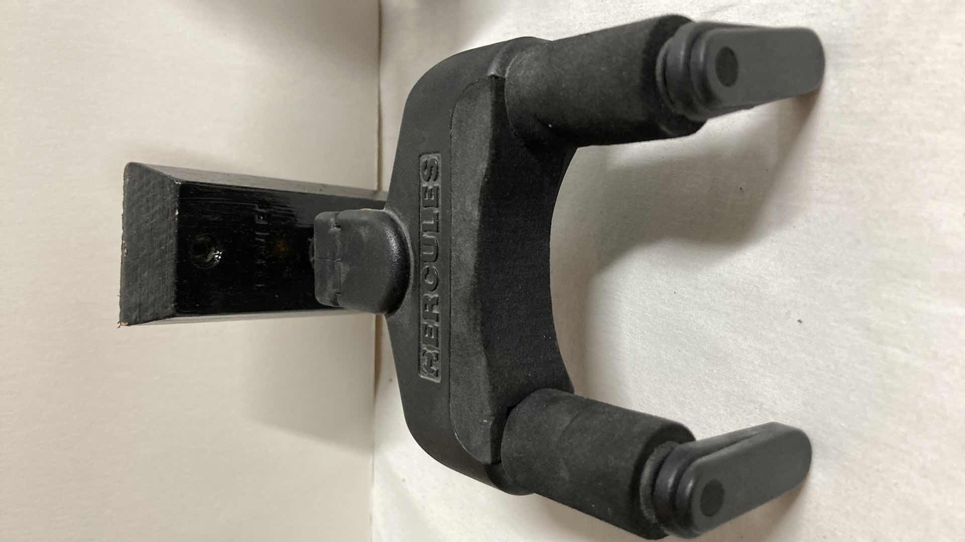 Photo 1 of HERCULES AUTO GRIP SYSTEM WALL MOUNTED GUITAR HANGER MODEL GSP38WB (2) W WALL MOUNTED GUITAR HANGERS (6)