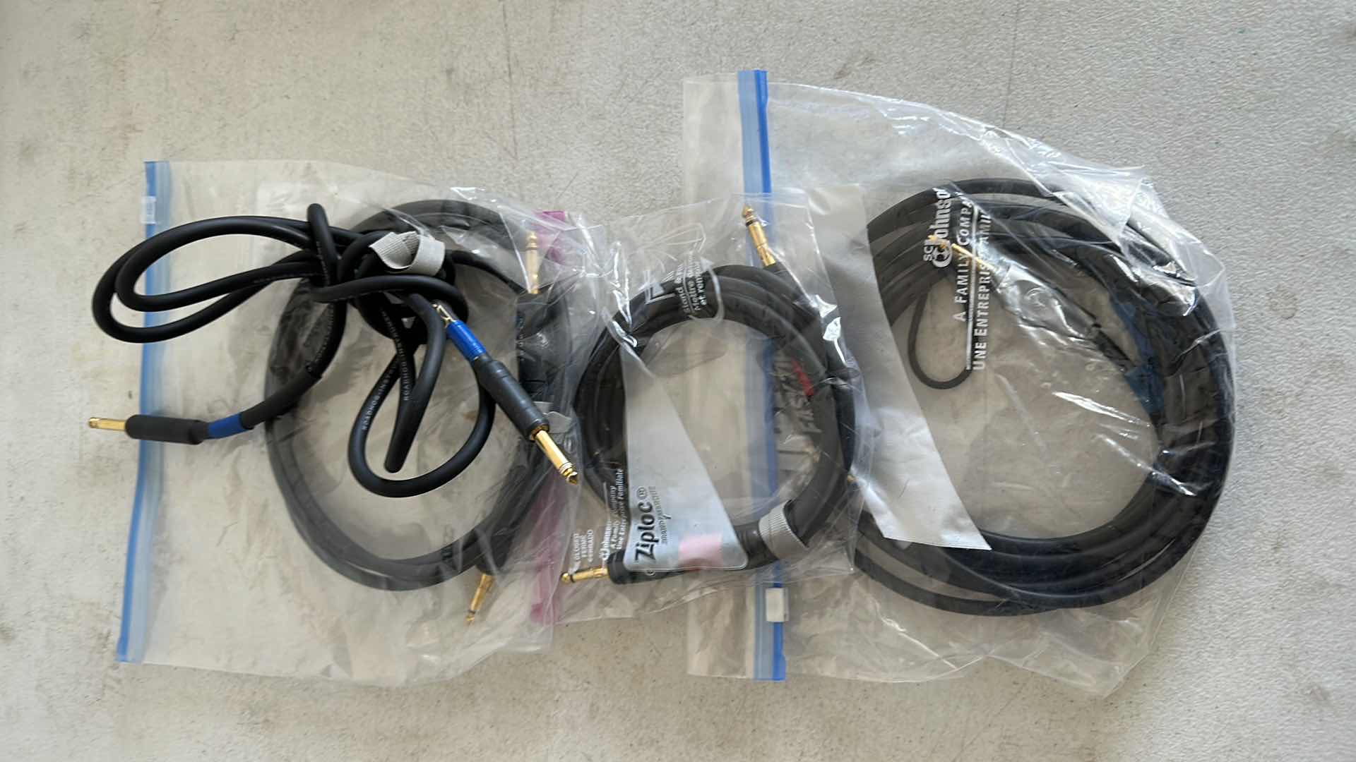 Photo 1 of FOUR GOLD TIPPED GUITAR CORDS