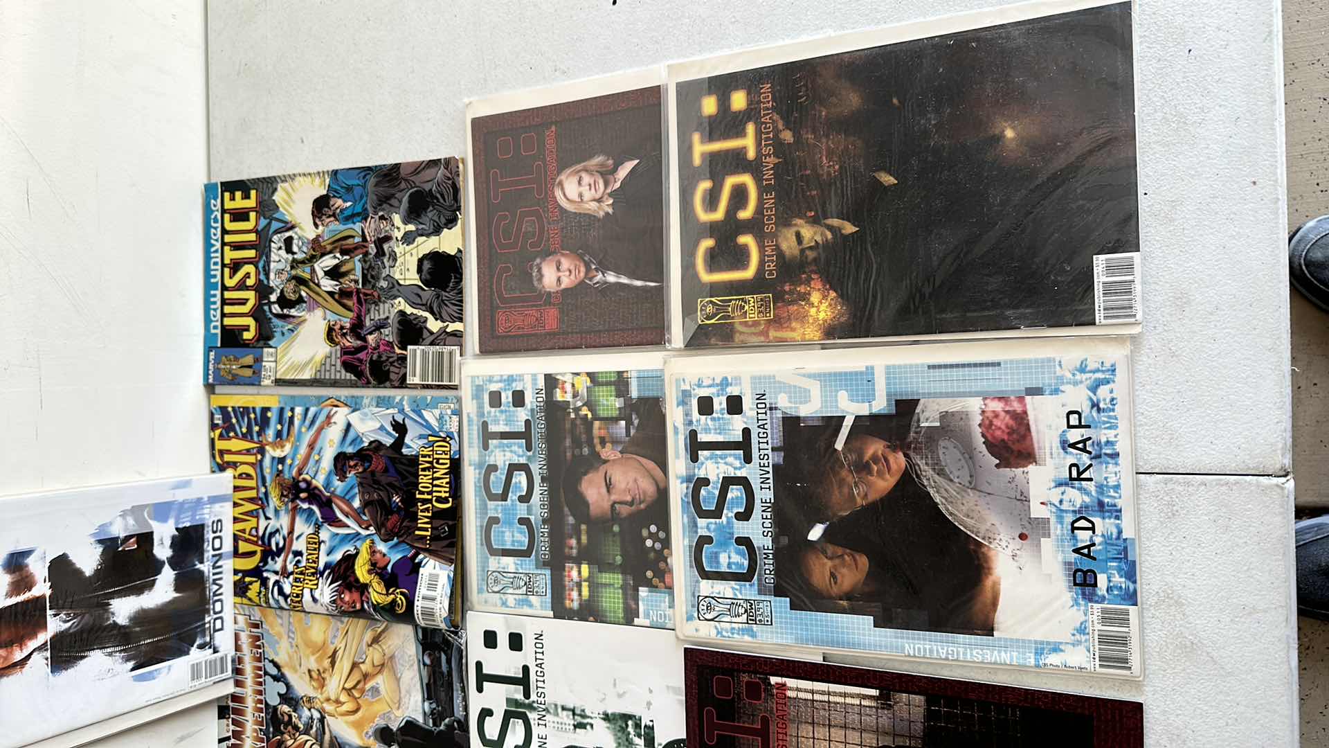 Photo 1 of CSI AND OTHER COMIC BOOKS