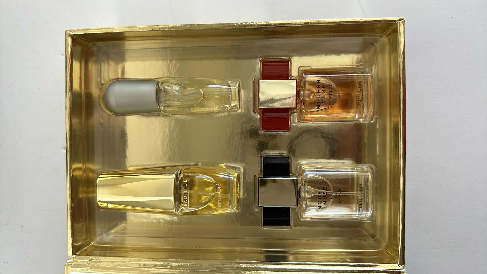 Photo 1 of CHANEL AND COACH GLASS CASES AND ESTE LAUDER PERFUME SAMPLER