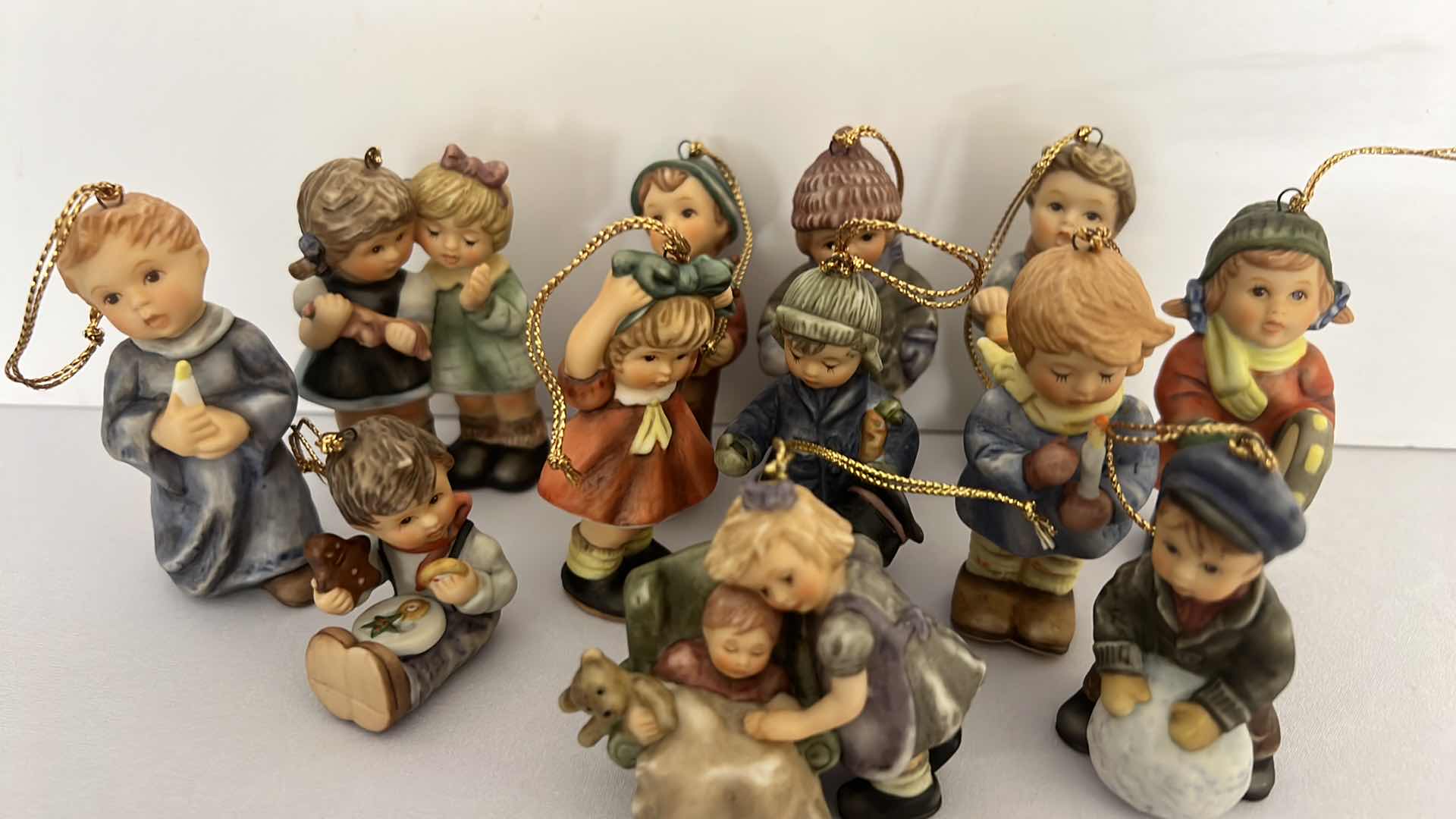 Photo 1 of 12-ASHTON DRAKE STUDIO COLLECTORS HUMMEL CHRISTMAS ORNAMENTS W COA’S