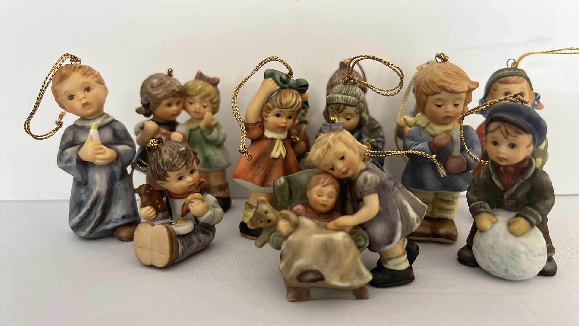 Photo 1 of 12-ASHTON DRAKE STUDIO COLLECTORS HUMMEL CHRISTMAS ORNAMENTS W COA’S