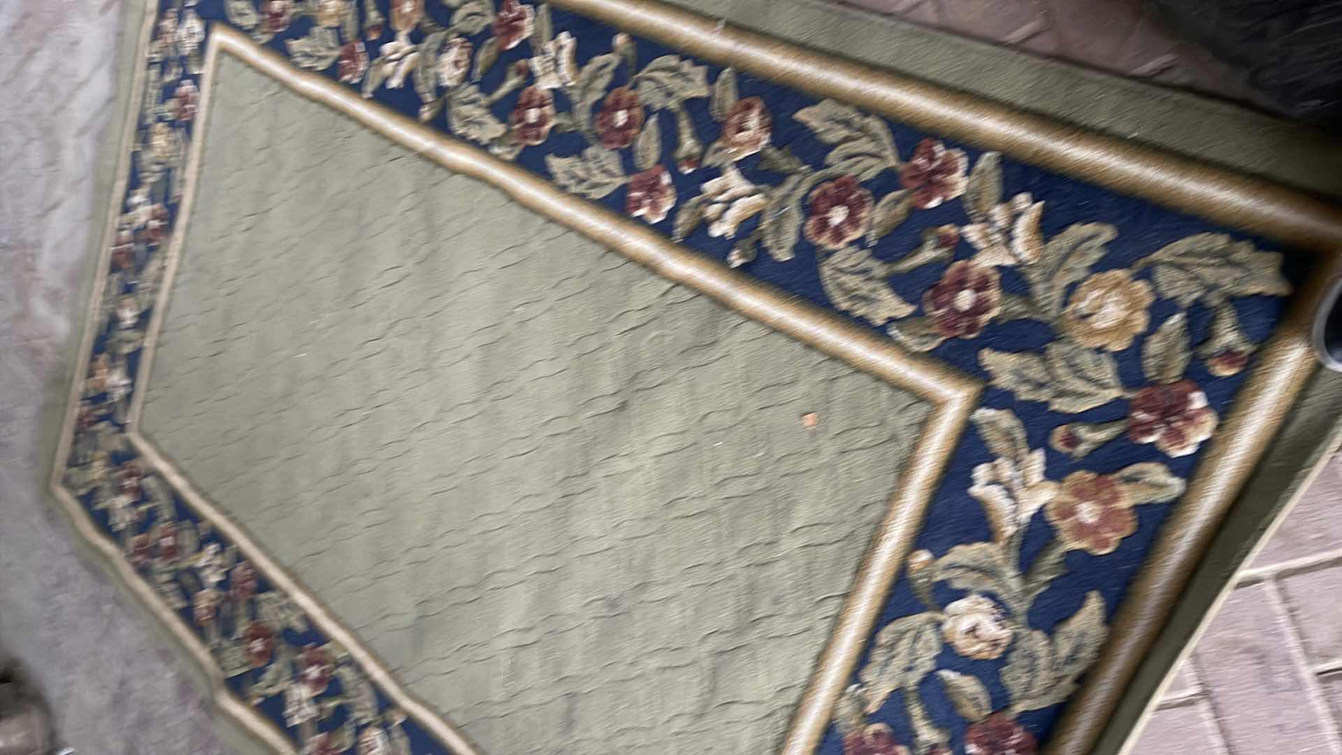 Photo 1 of FLORAL EDGE AREA RUG 62x90 
NEEDS TO BE CLEANED