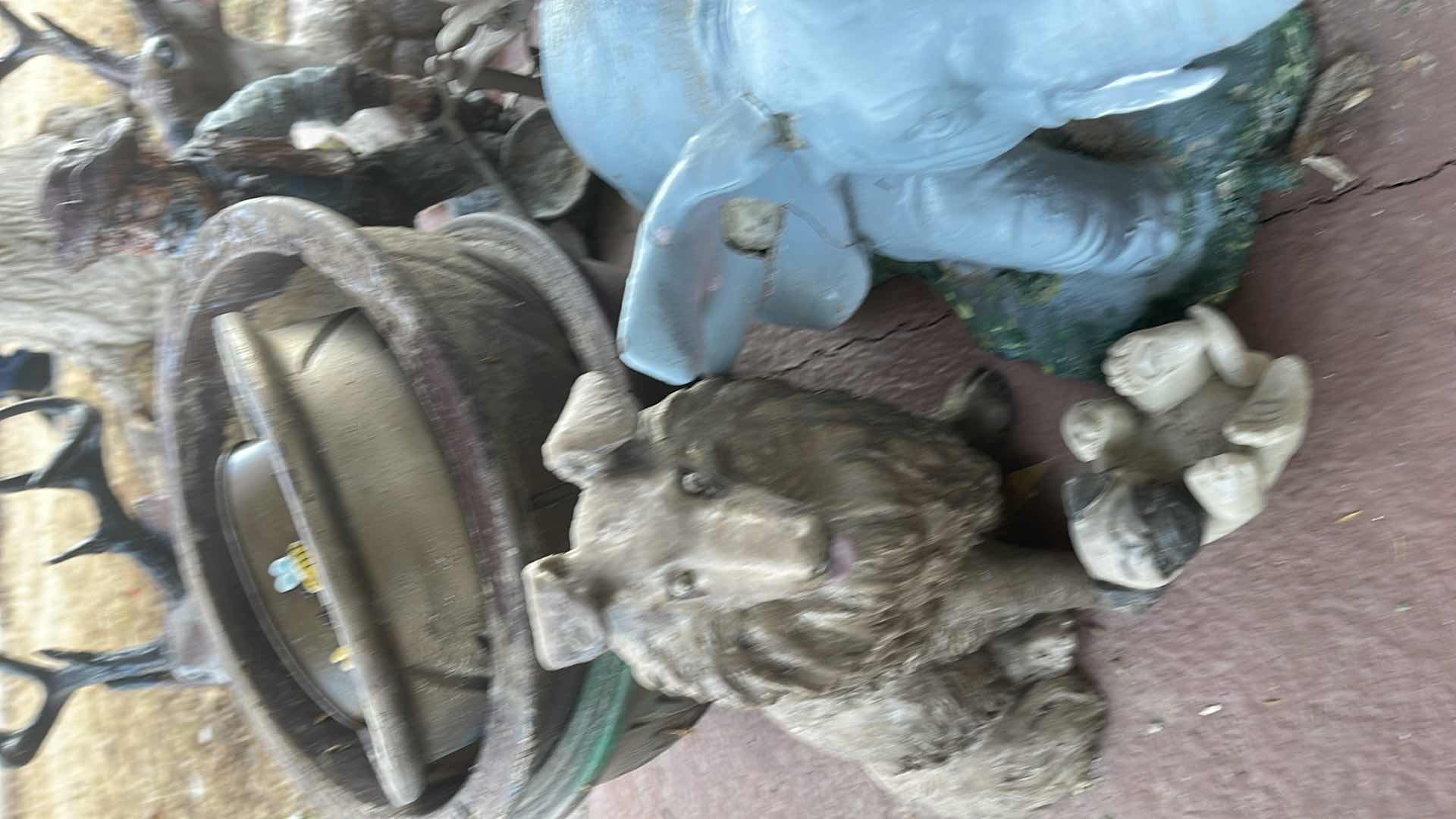 Photo 1 of FOUNTAIN APPROX 30” H & ASSORTED LAWN DECOR 
AS IS CONDITION