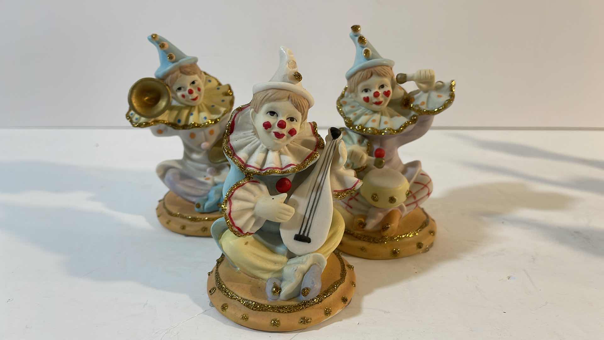 Photo 1 of CLOWN COLLECTION PORCELAIN FIGURINES H-5”