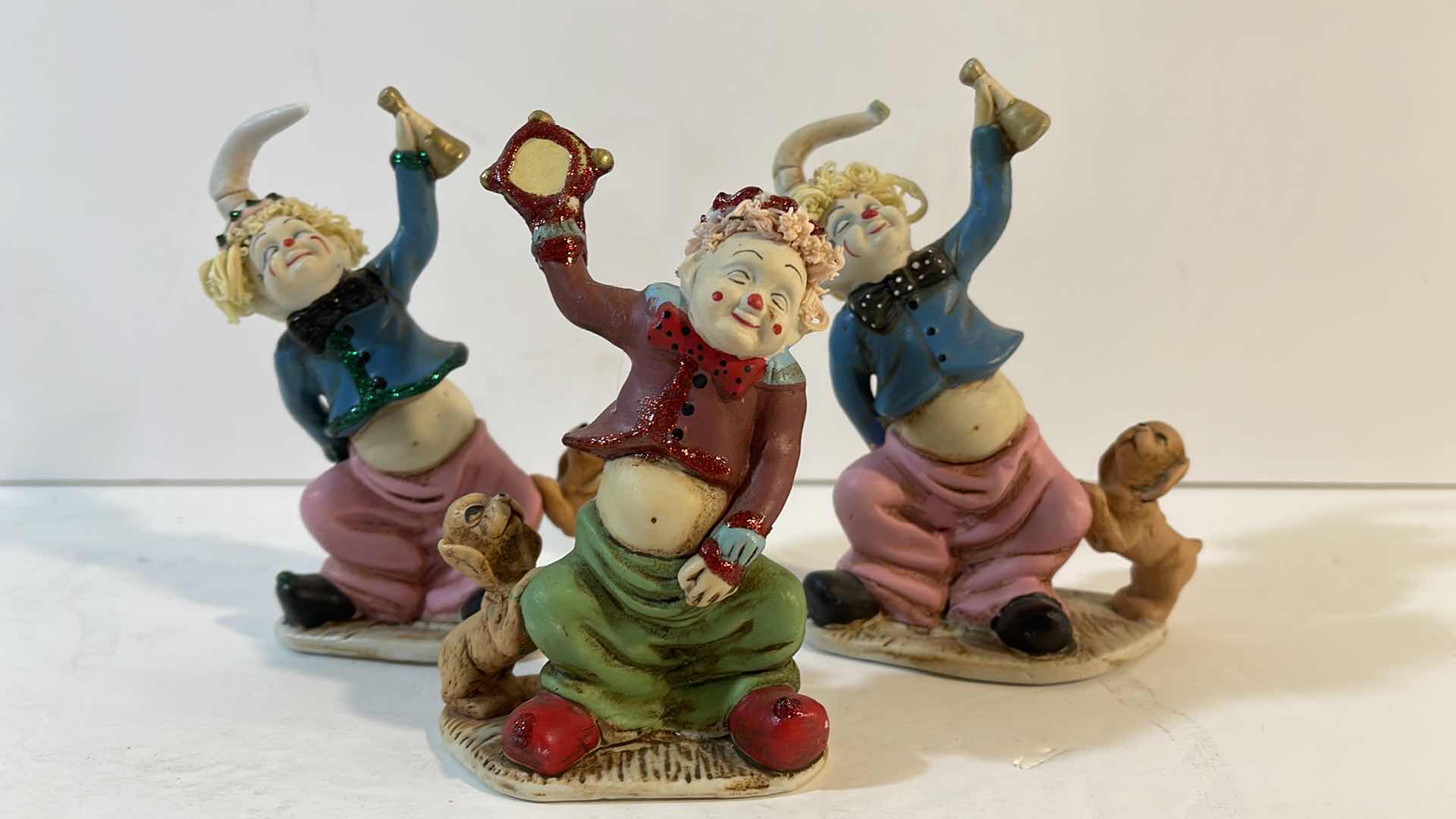 Photo 1 of CLOWN COLLECTION PORCELAIN FIGURINES H-5”